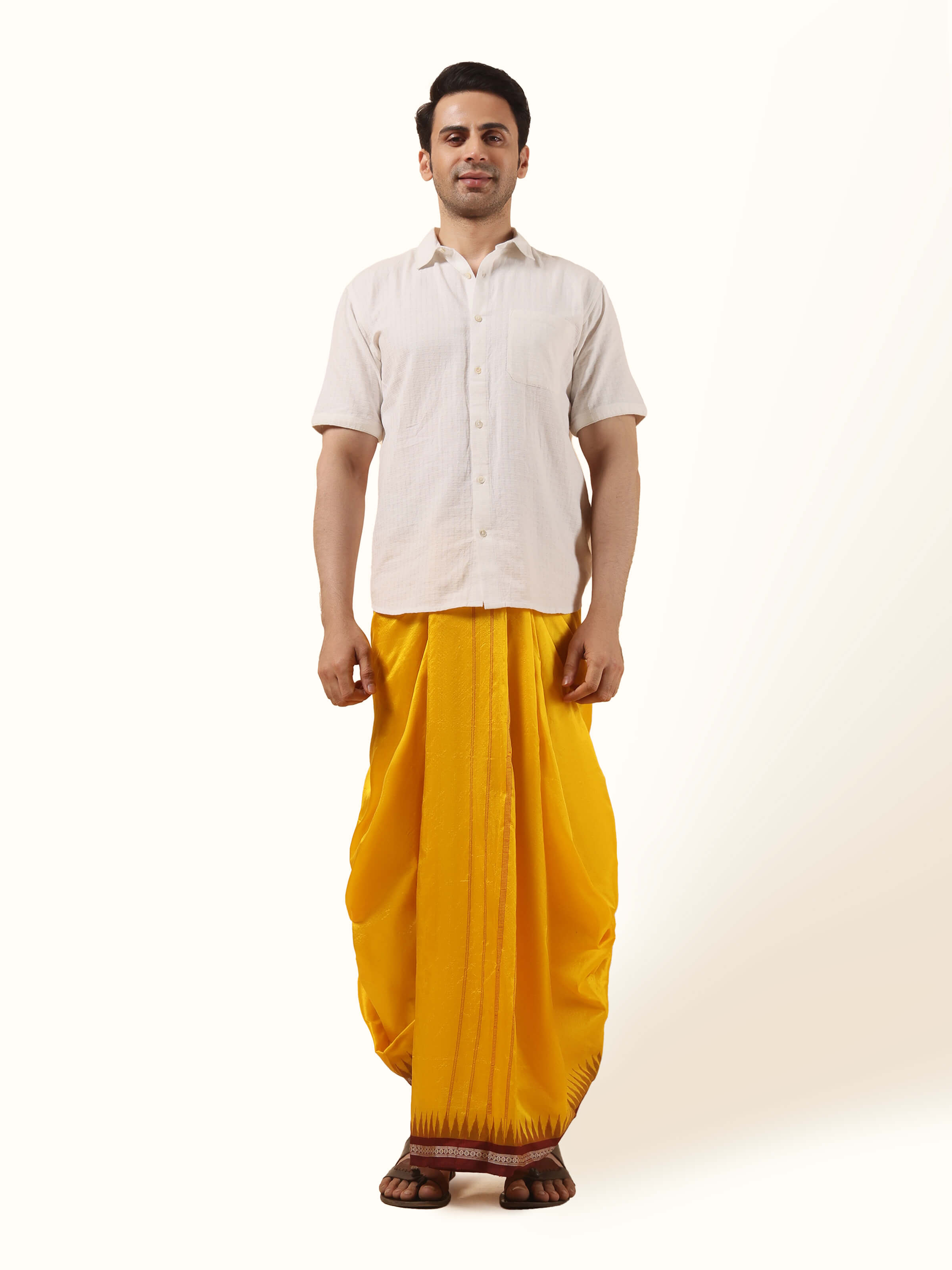Front view of Yellow Mulberry Silk Unstitched Dhoti with smooth silk texture and bright hue