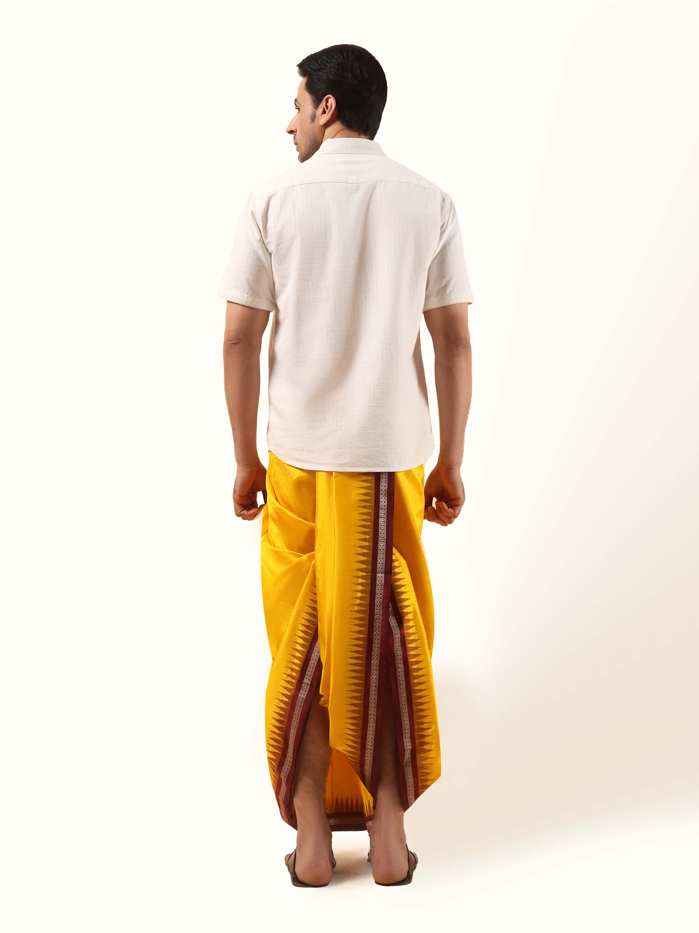 Back view showing full length and fine finish of Yellow Mulberry Silk Dhoti fabric