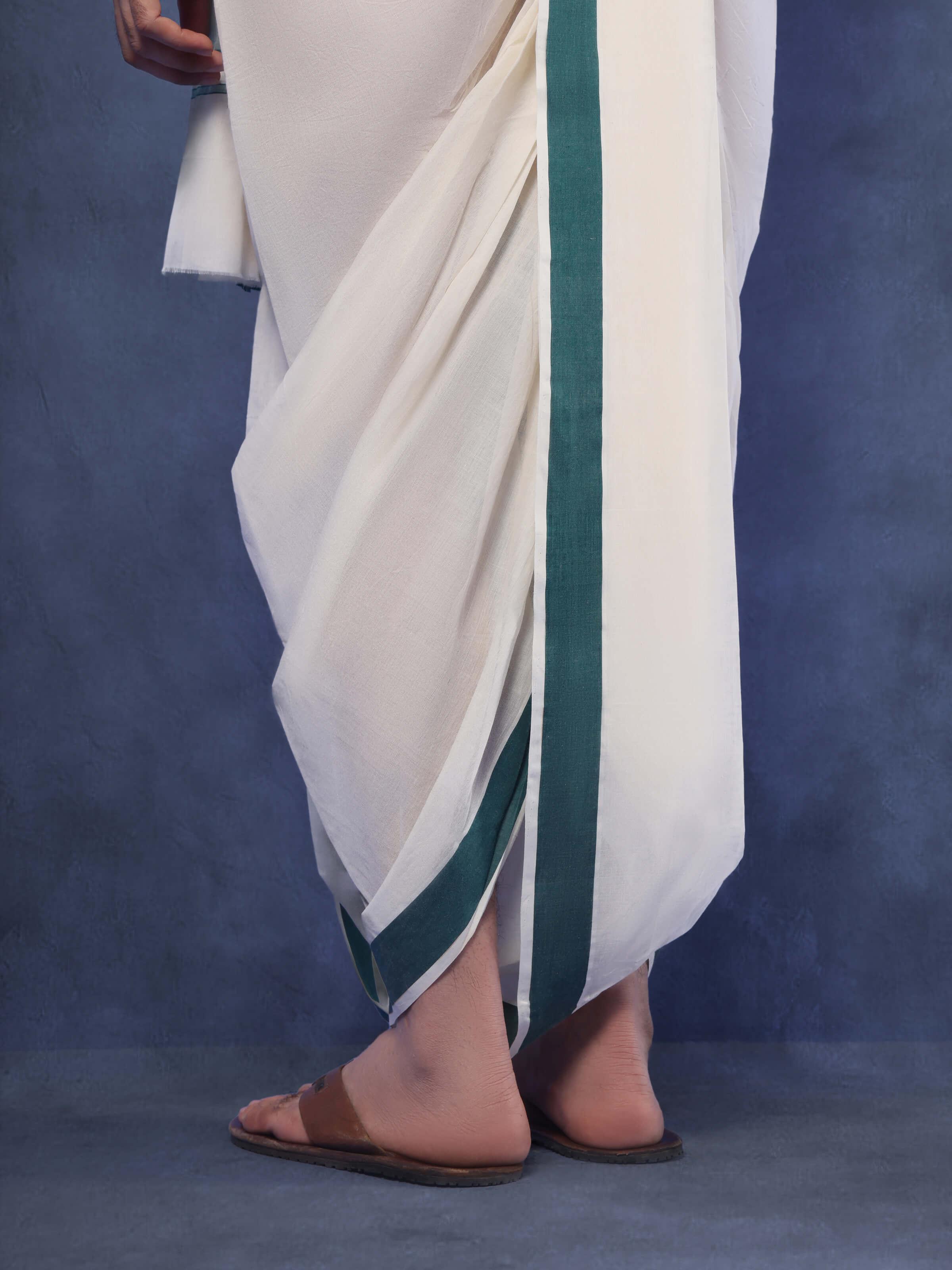 Angled view of green cotton angavastram set showing fine cotton weave and twin piece layout