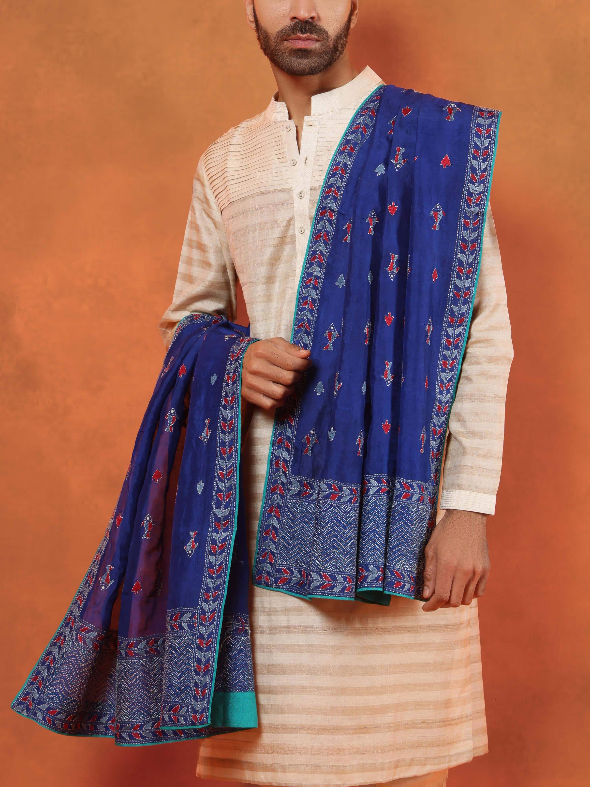 Angled view of Blue Mulberry Silk Kantha Embroidered Stole highlighting detailed embroidery and soft silk texture.