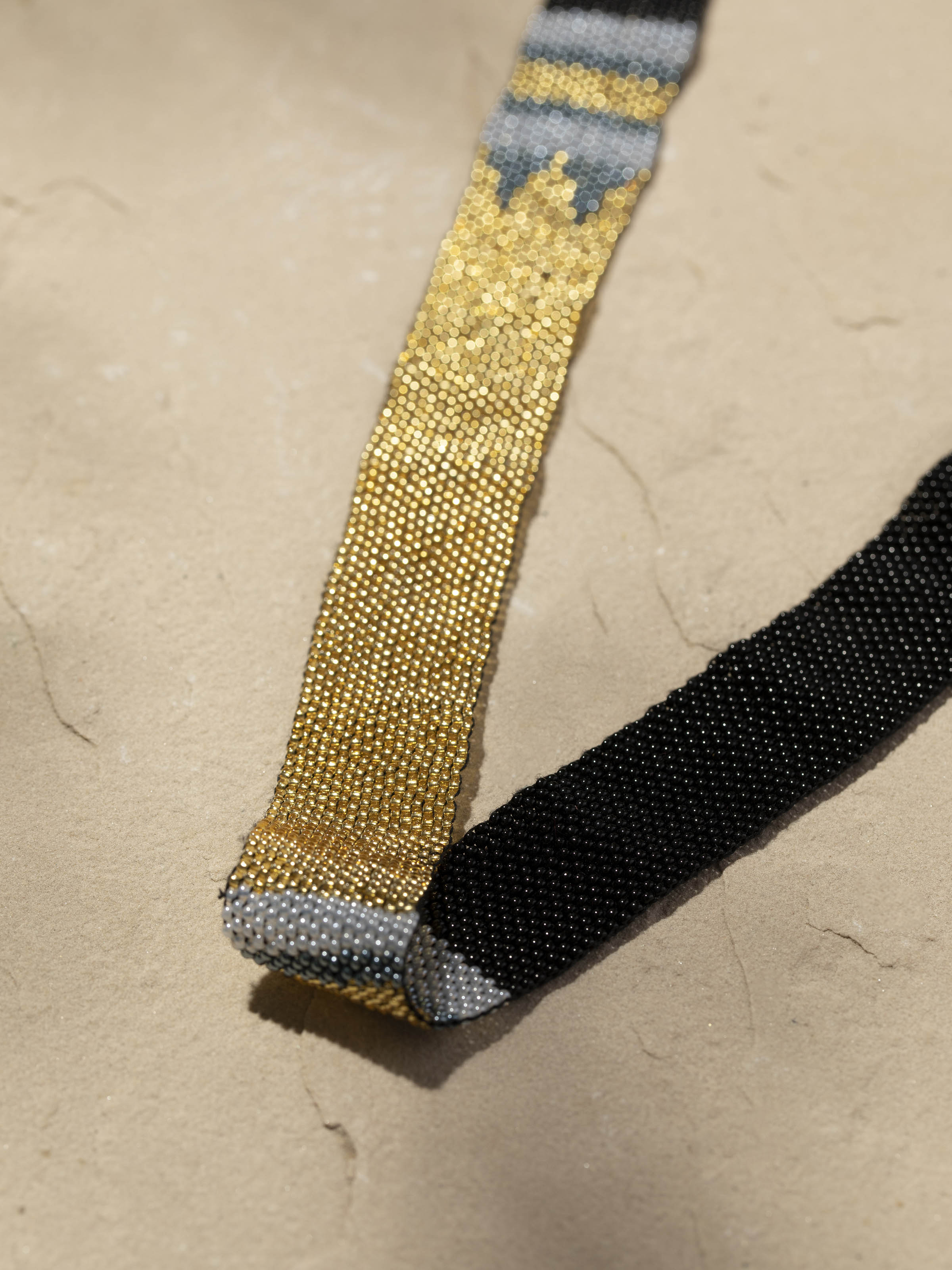 Detailed view of Glass Beads Long Necklace highlighting its intricate design and colorful beads.