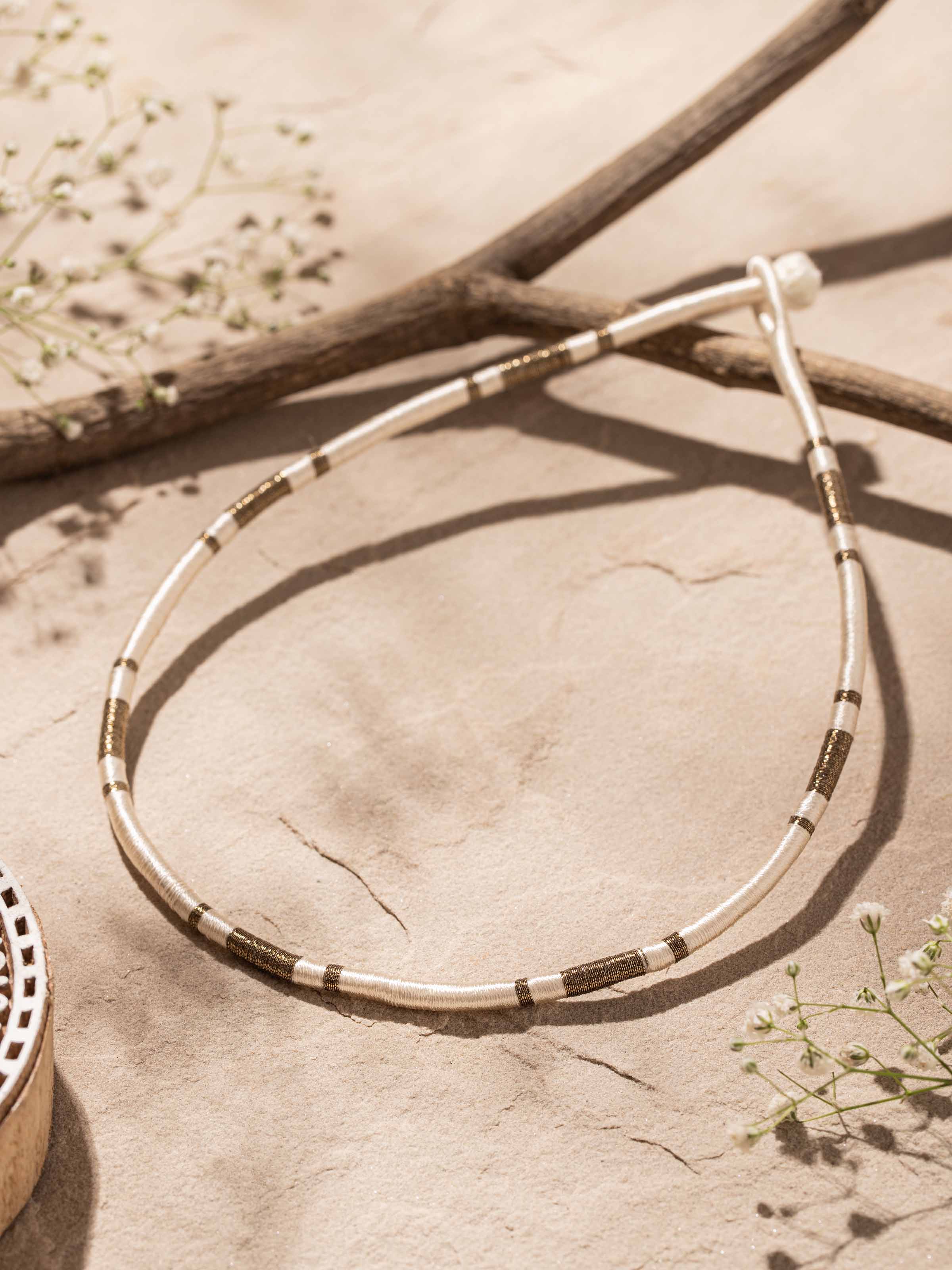 Side view of Patwa Collar Necklace, highlighting intricate details