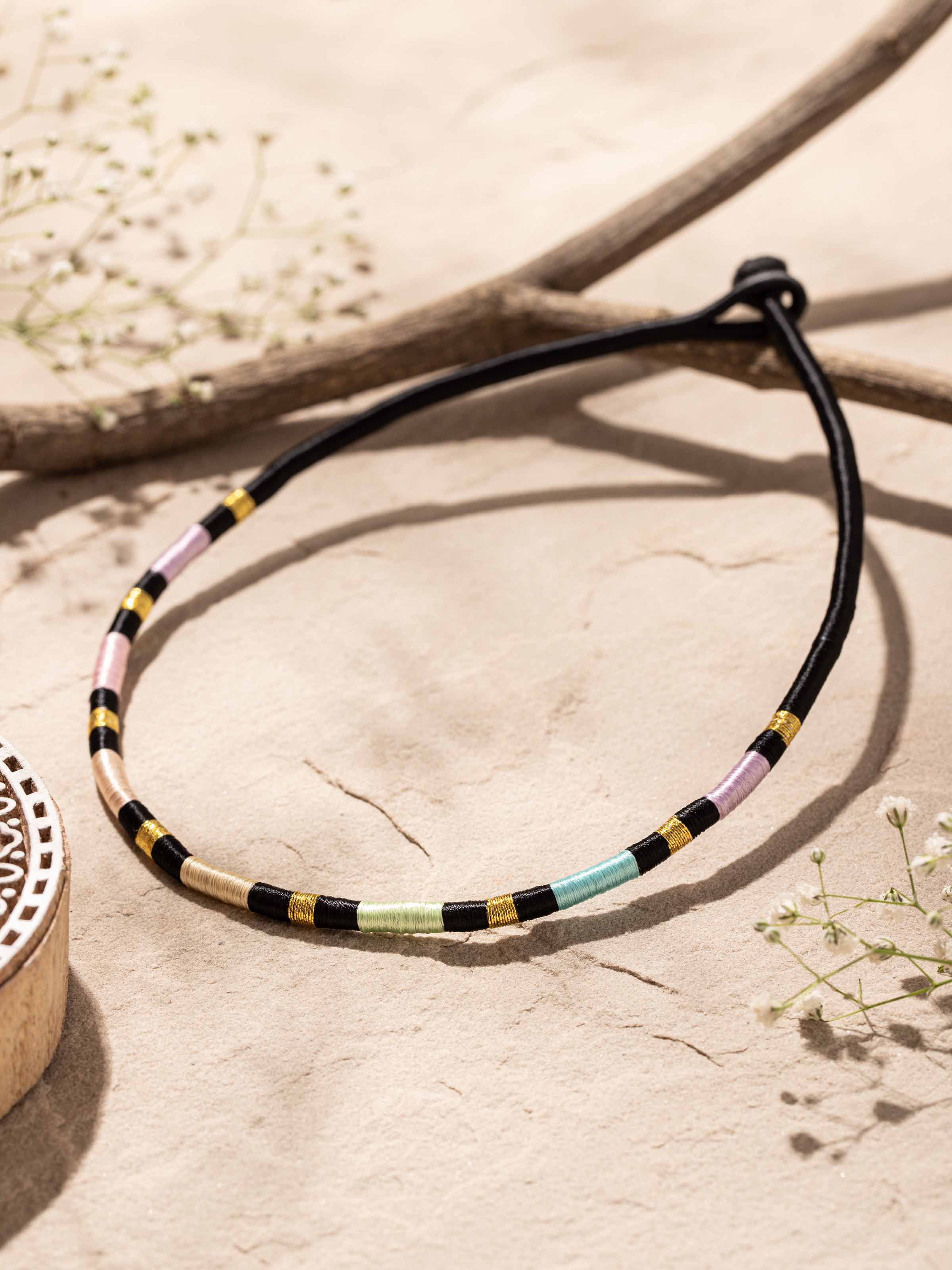 Close-up of Patwa Collar Necklace highlighting the intricate patwa design and collar details.