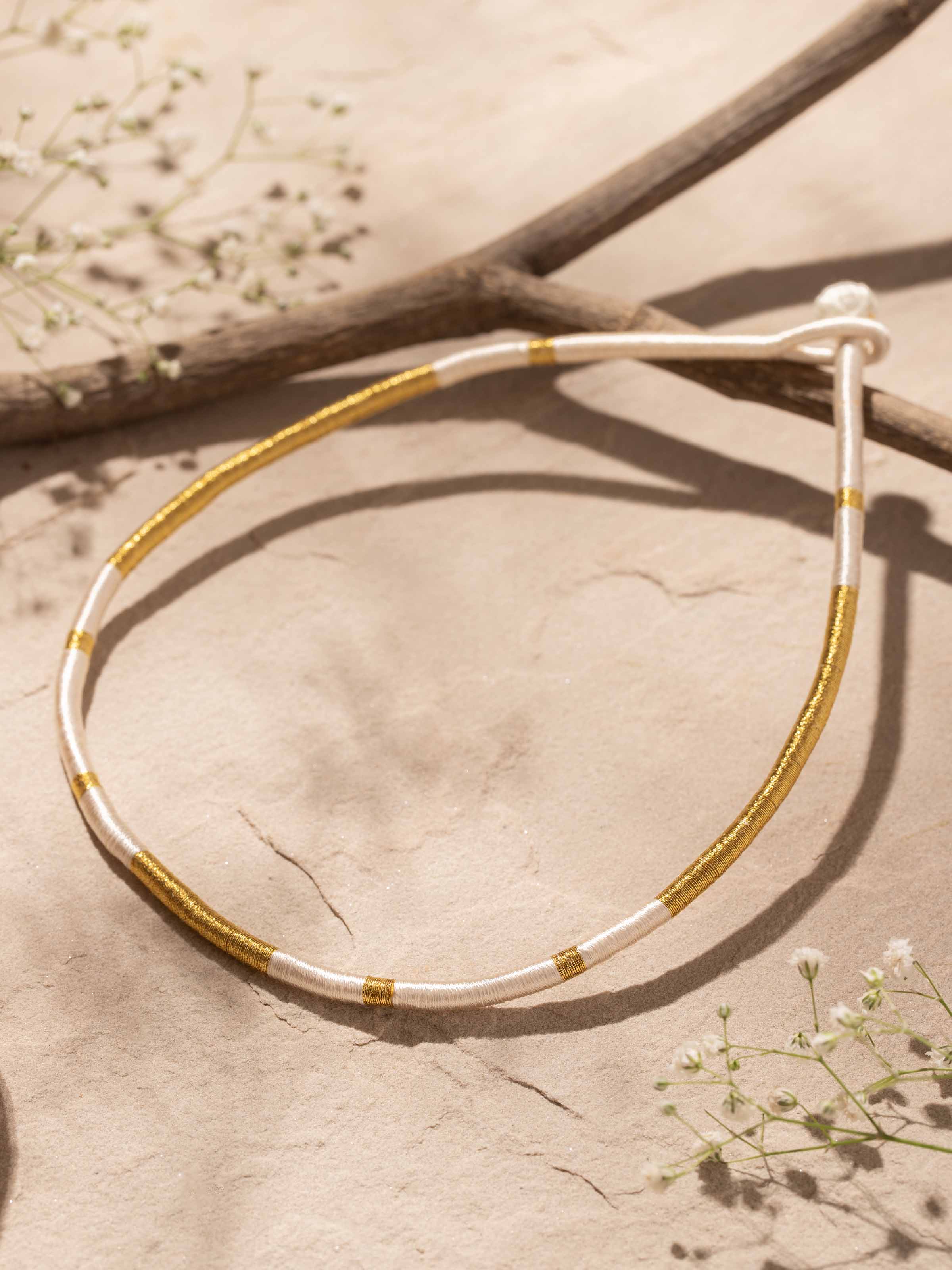 Side view of Patwa Collar Necklace highlighting its elegant curves and detailed craftsmanship