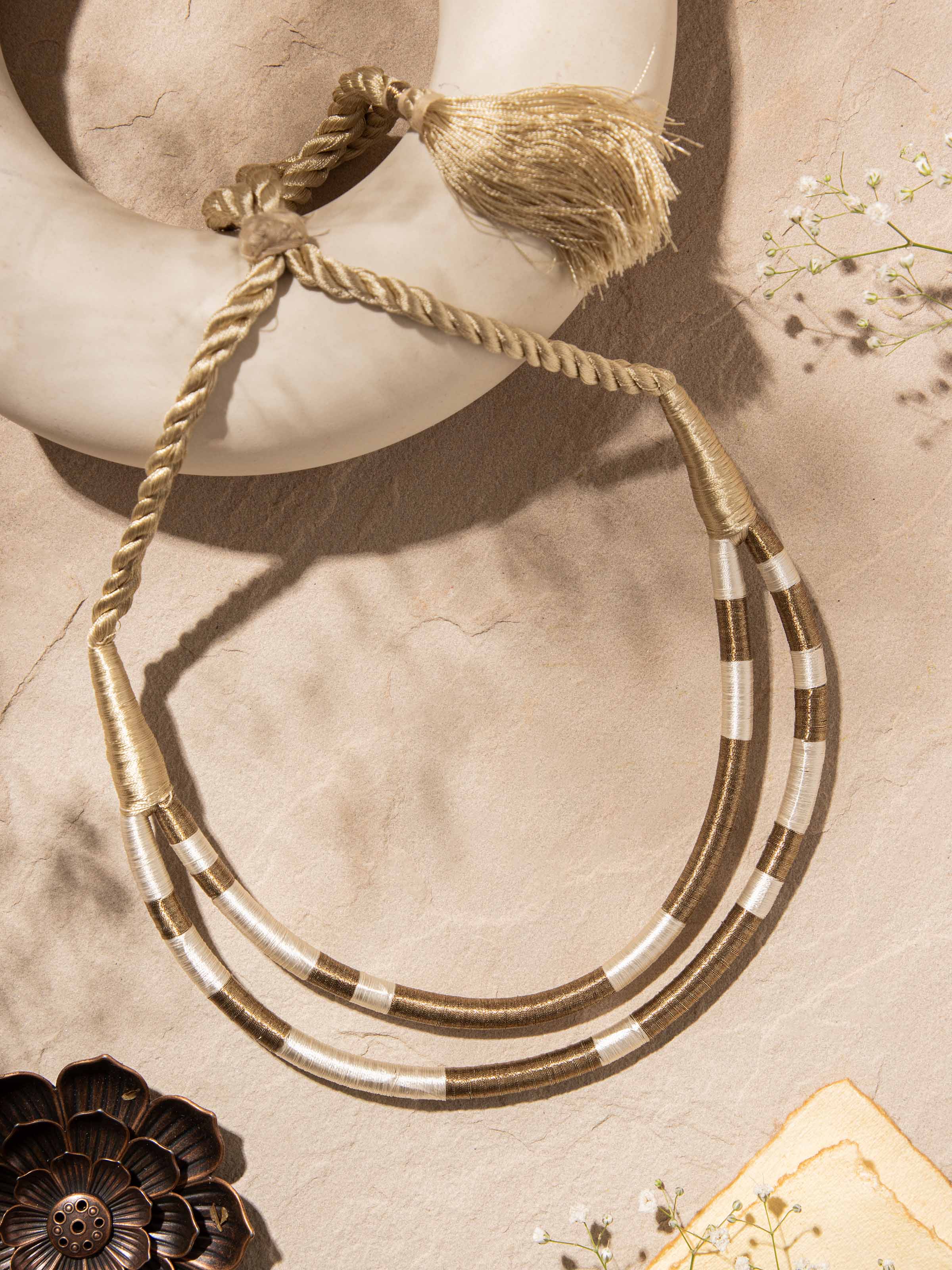 Close-up view of Patwa collar necklace highlighting detailed beadwork and design