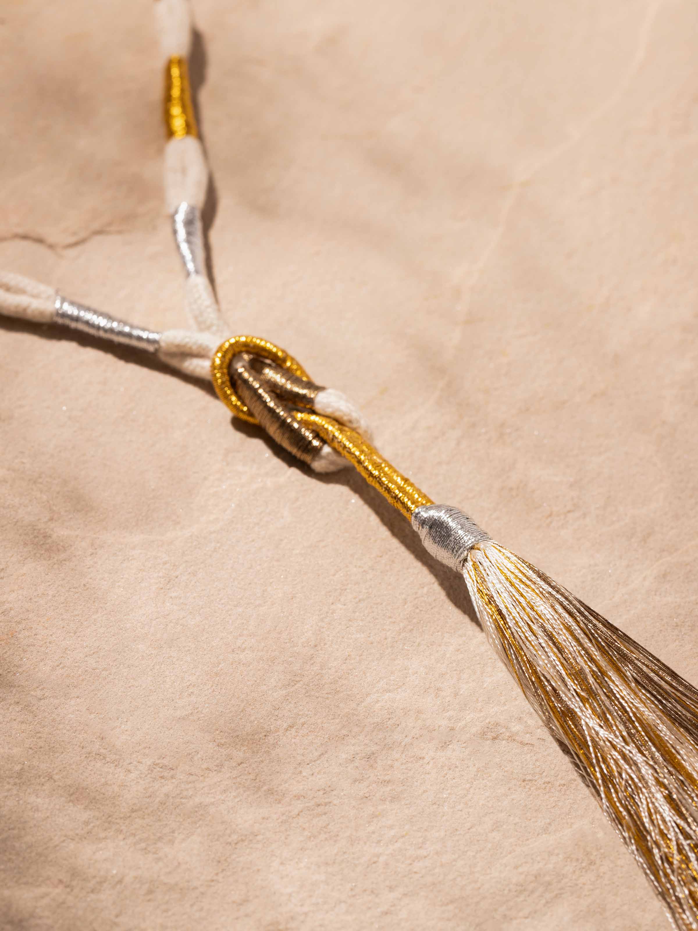 Detailed view of Patwa long necklace focusing on its vibrant beadwork and traditional craftsmanship