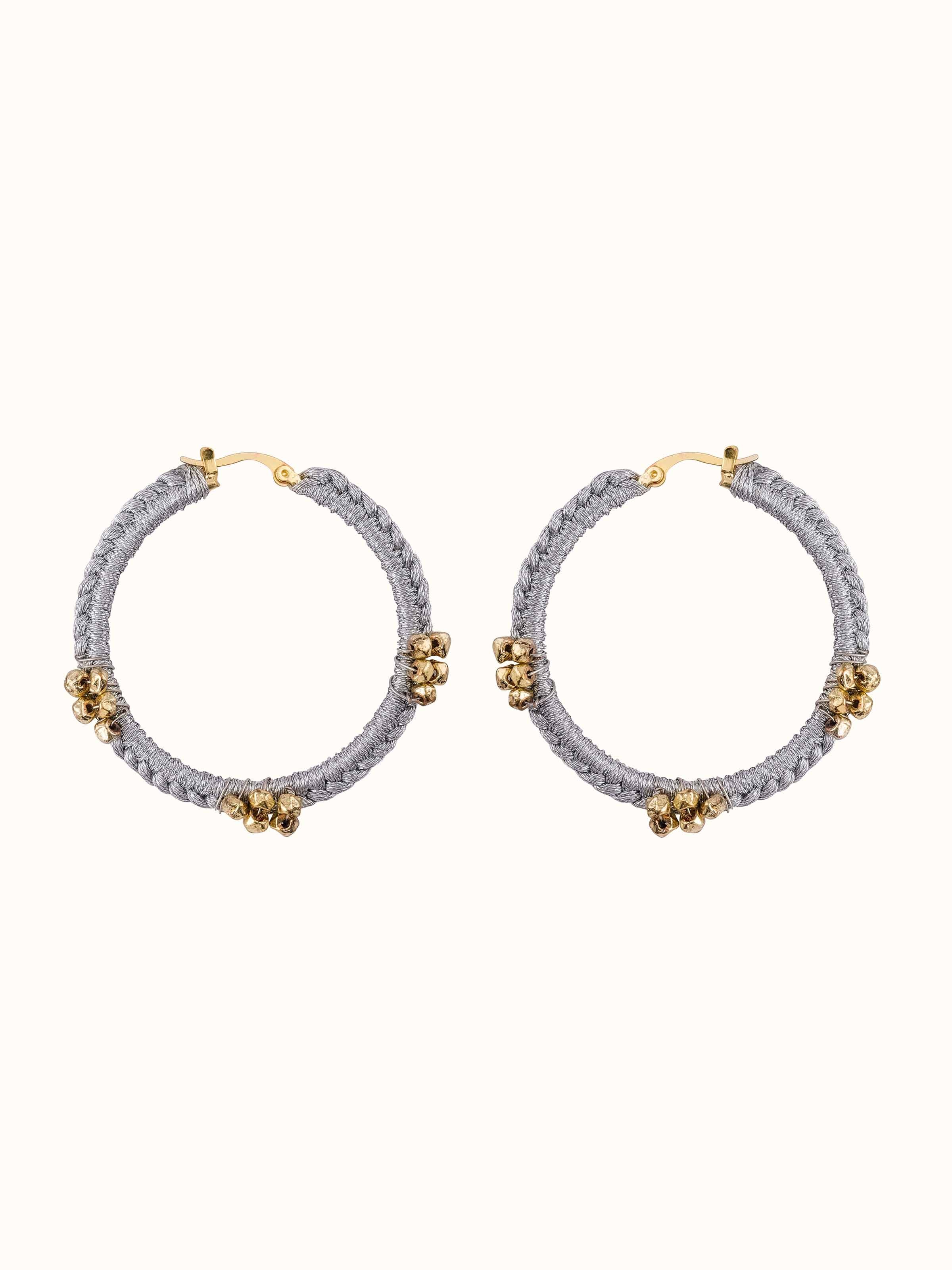 Front view of Zari Patwa hoop earrings showcasing their elegant design and intricate details