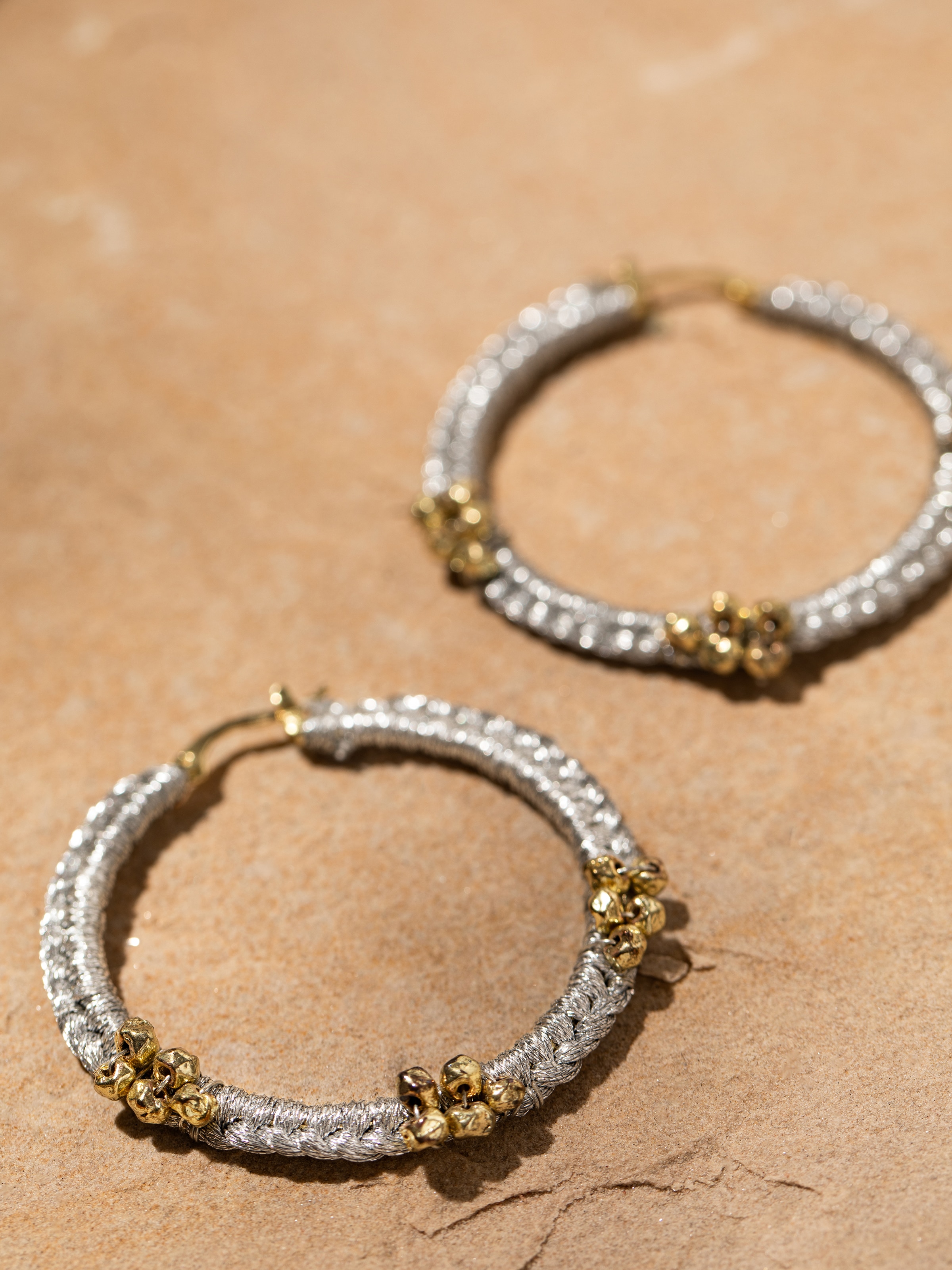 Detailed front view of Zari Patwa hoop earrings highlighting their fine craftsmanship and style