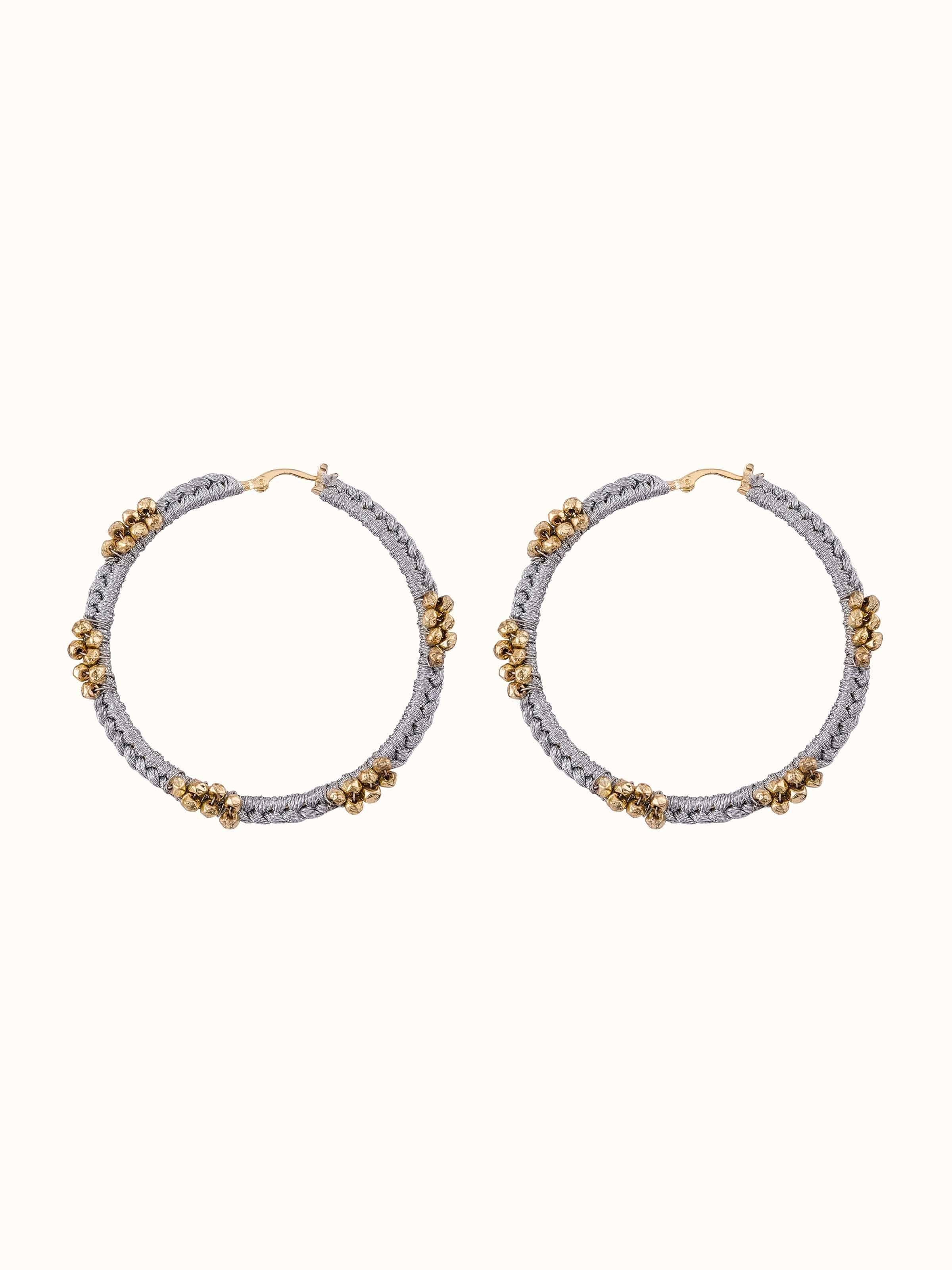 Front view of Zari Patwa Hoop Earrings showcasing intricate zari detailing.