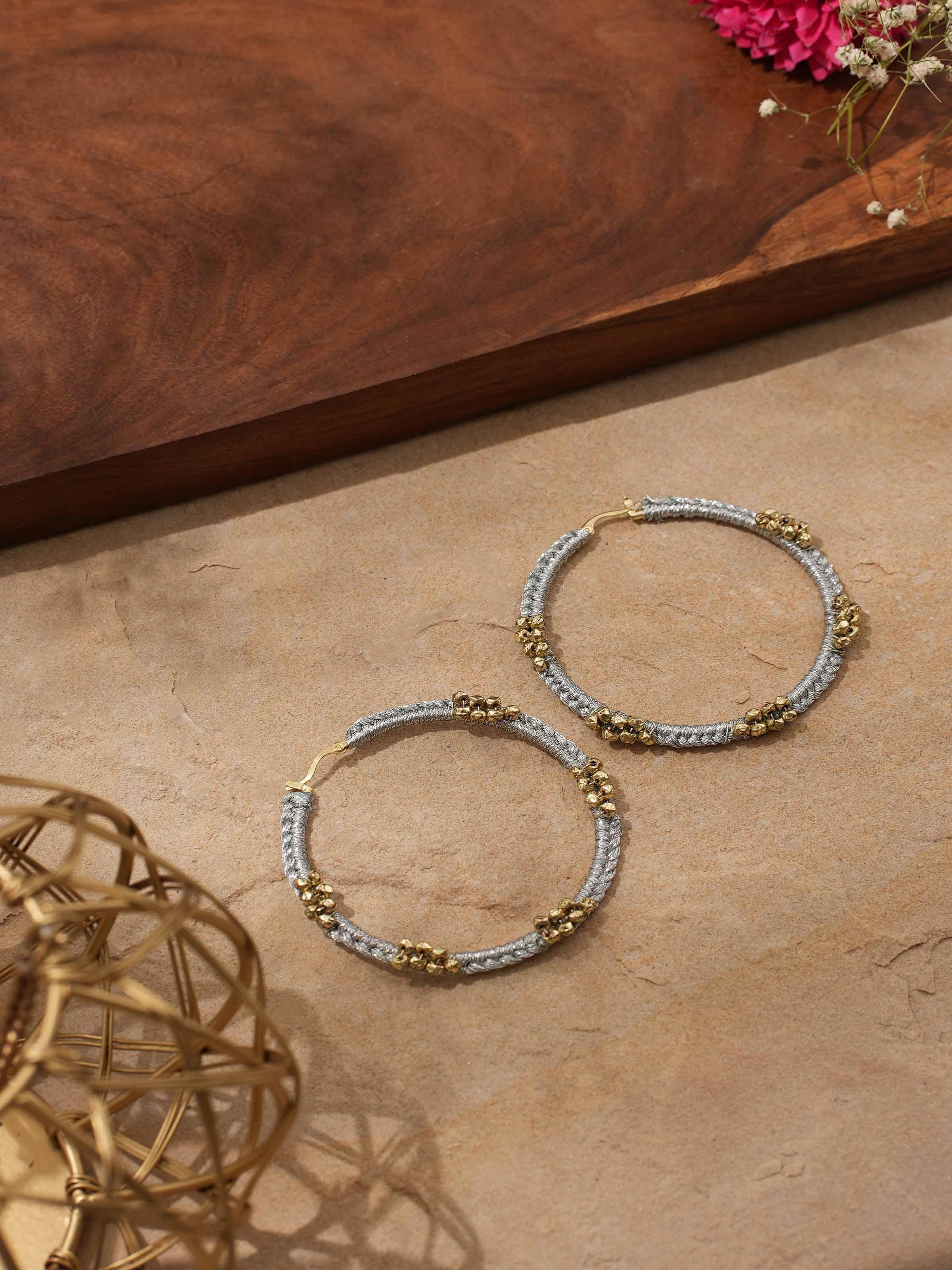 Detailed view of Zari Patwa Hoop Earrings focusing on fine zari details.