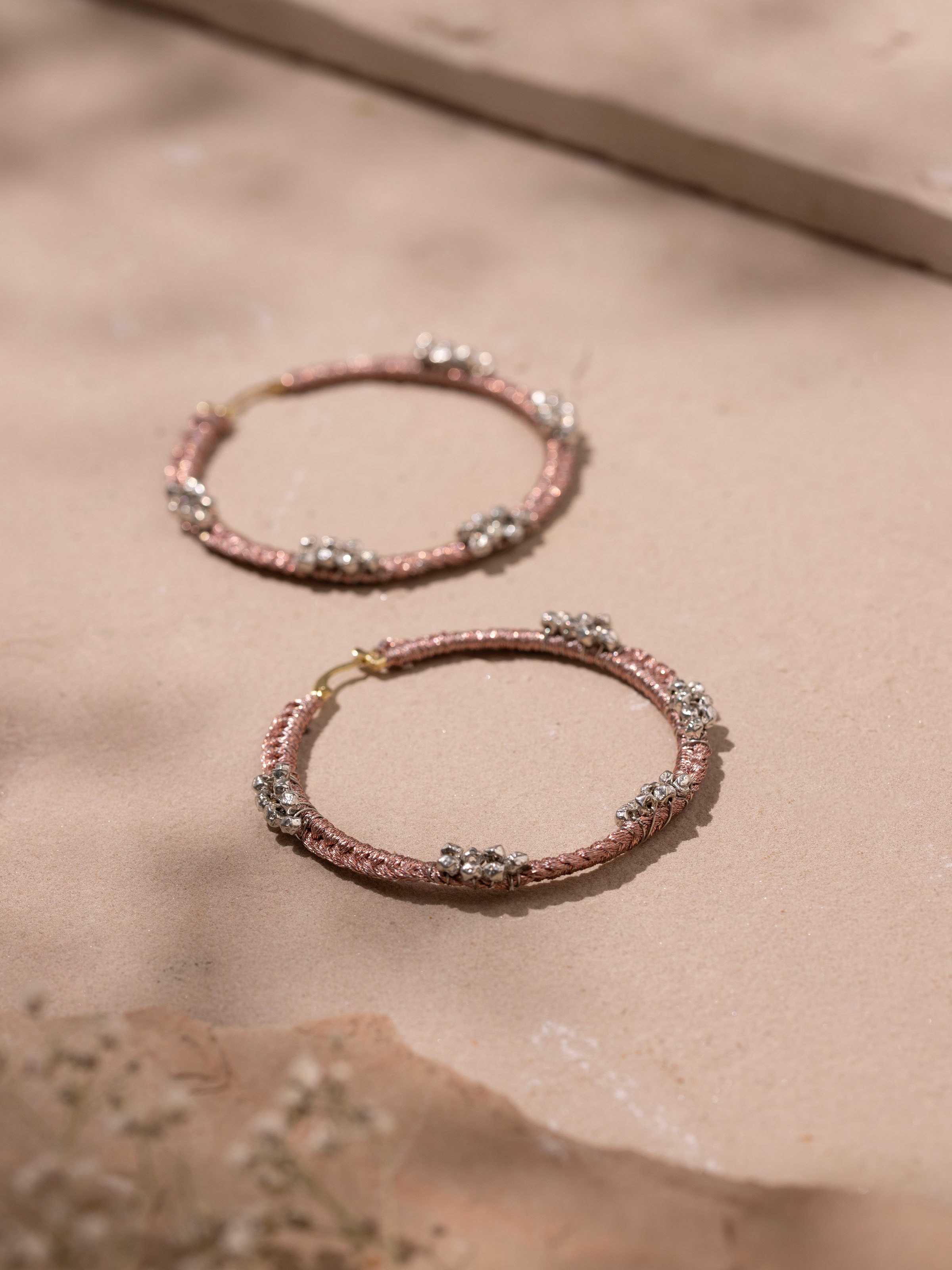 Back view of Zari Patwa Hoop Earrings showing the clasp and overall hoop design.