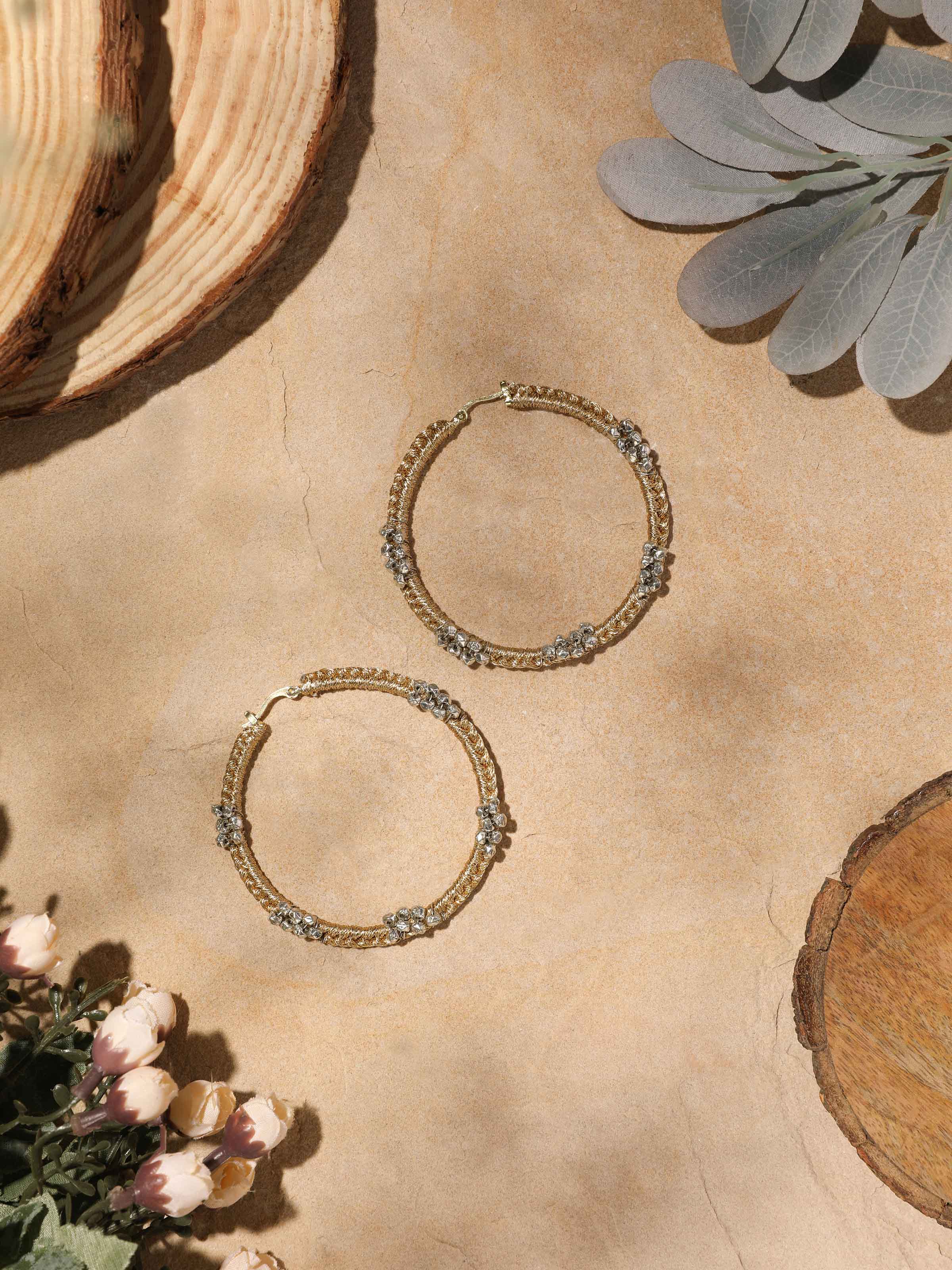 Close-up of Zari Patwa Hoop Earrings highlighting detailed embroidery and hoop design.