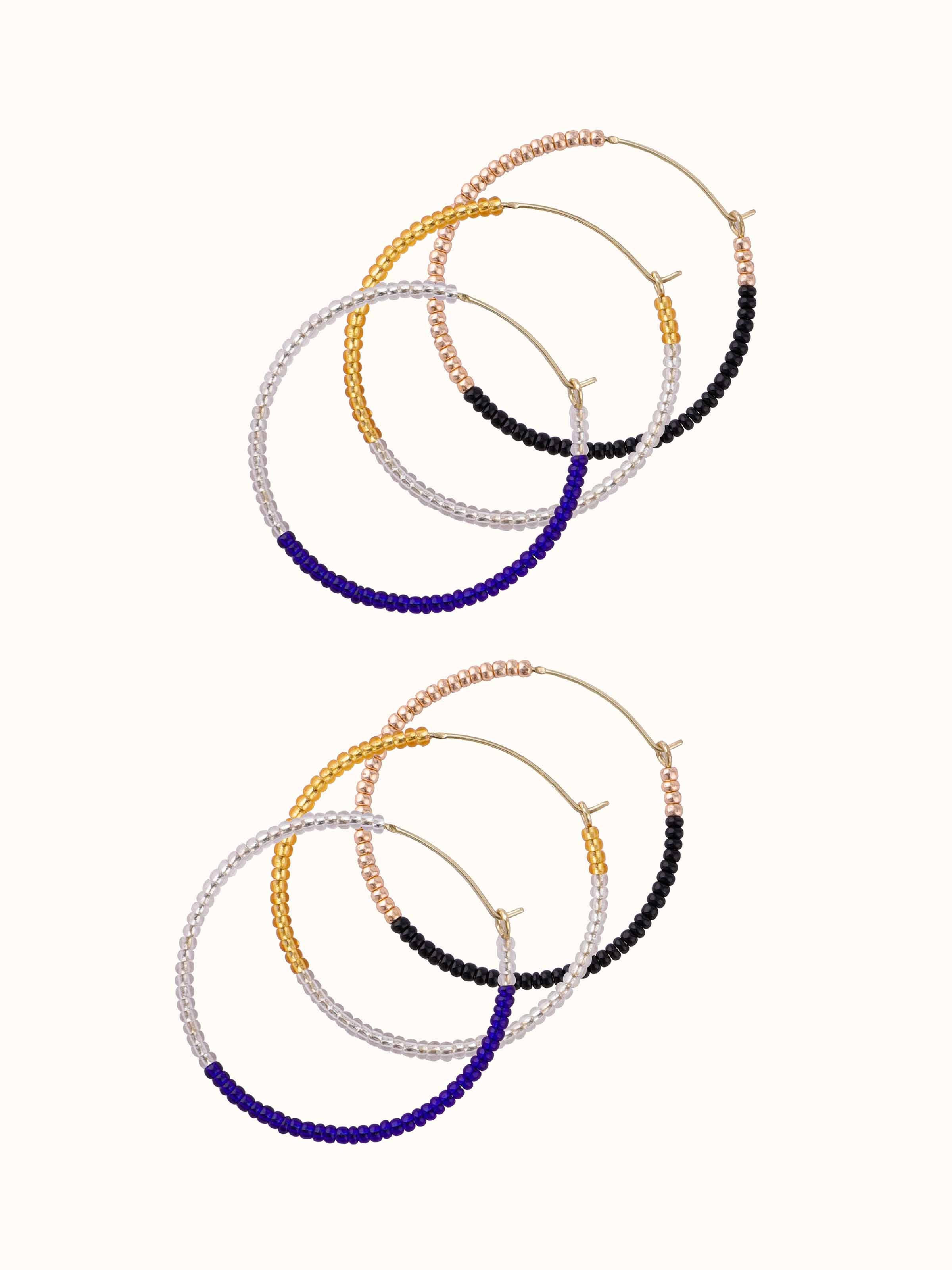 Overhead view of handcrafted earrings displaying overall shape and design