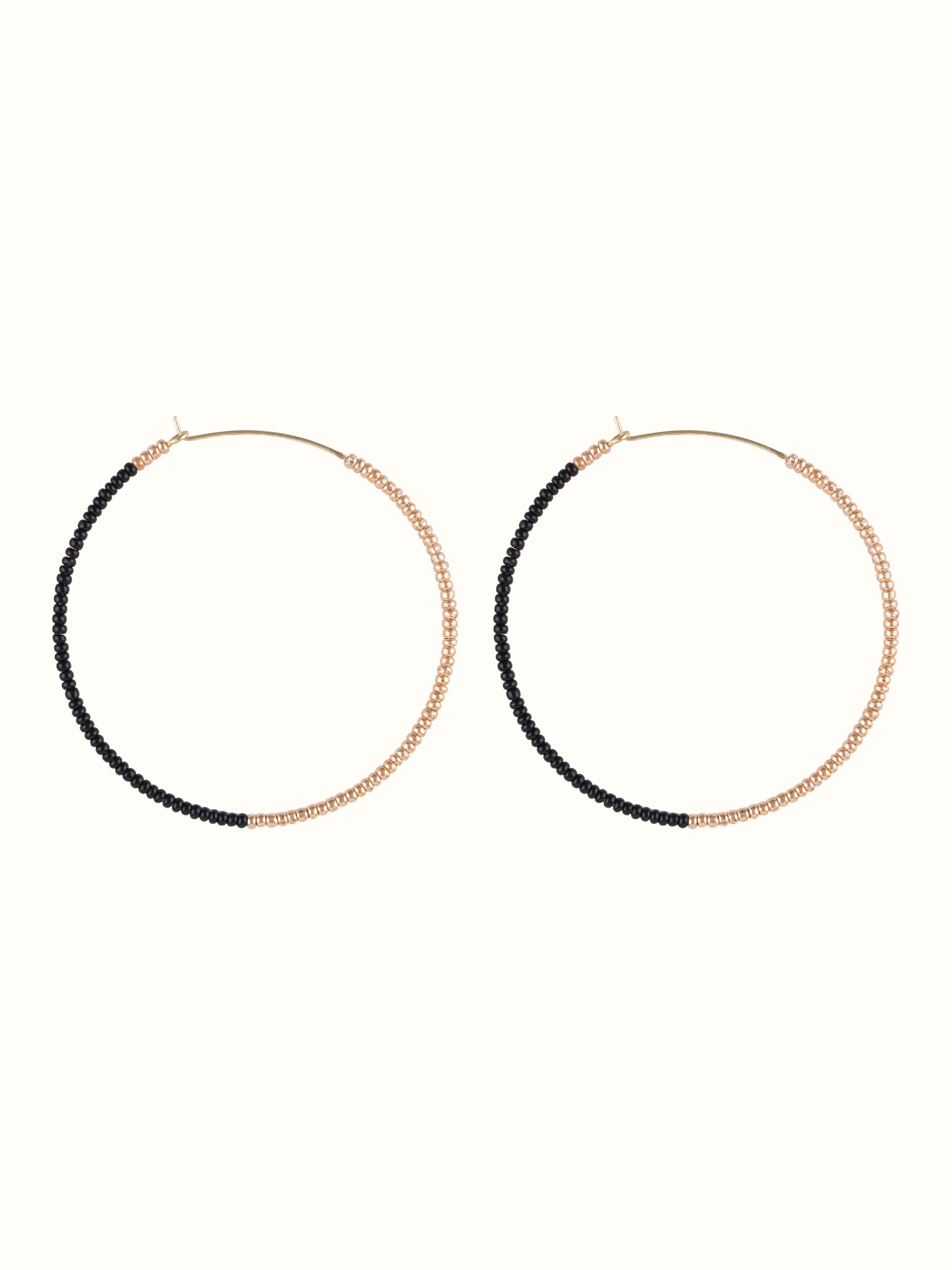 Front view of Handcrafted Hoop Earrings displaying intricate design and fine craftsmanship.