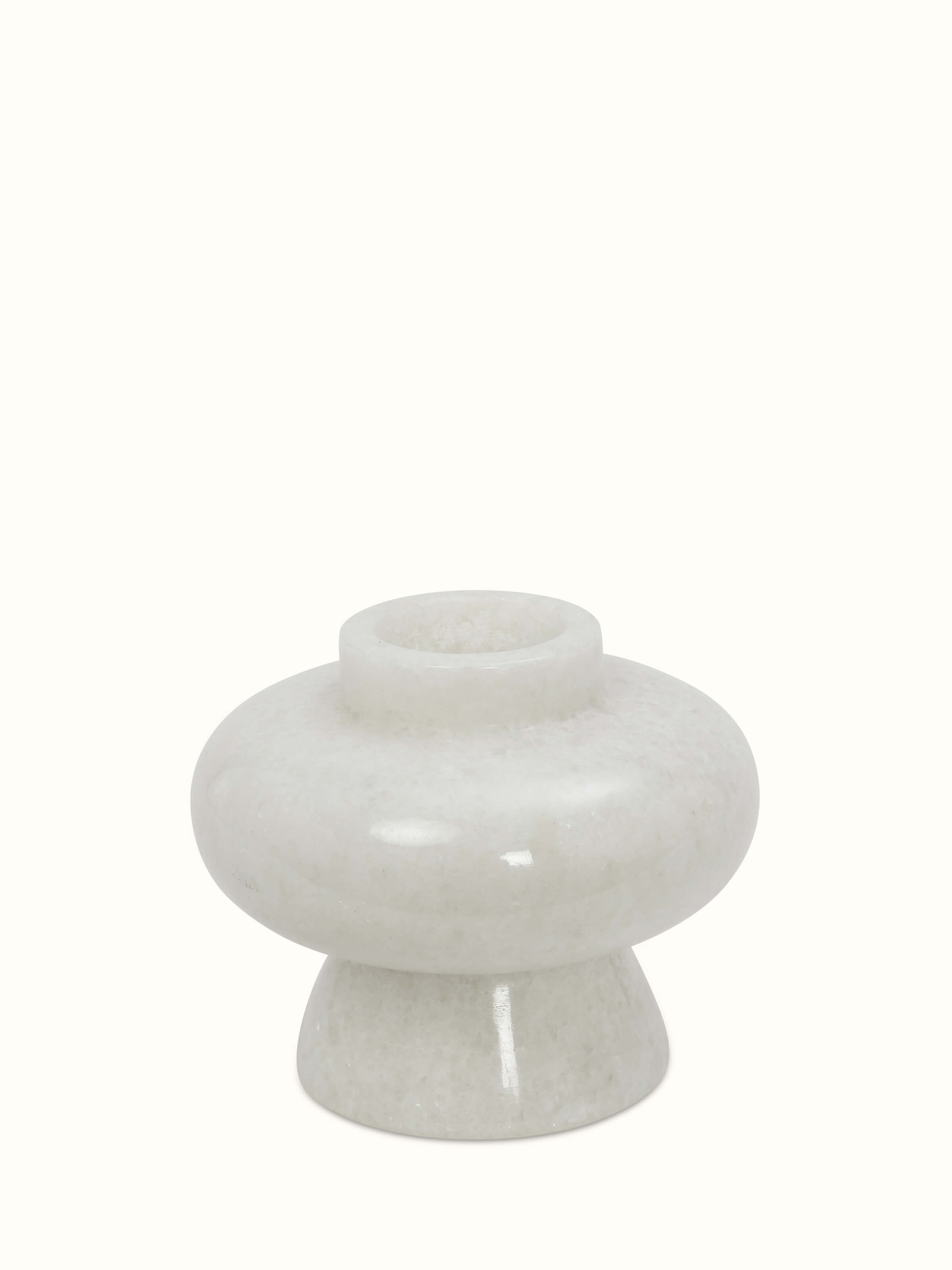 Front view of Carved marble tea light holder in white color highlighting the elegant carving and smooth marble finish.