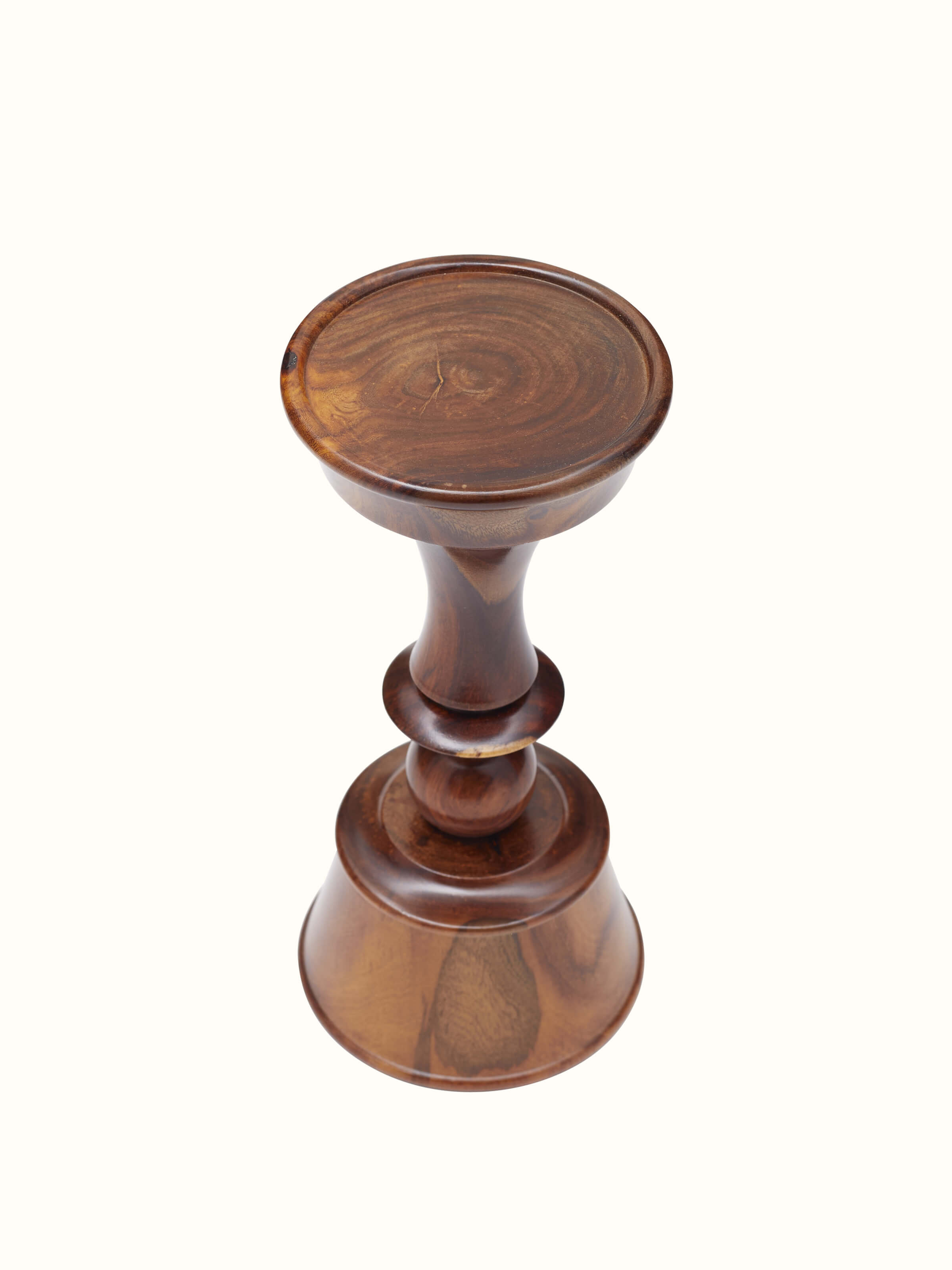 Side view of Sheesham wood candle holder showcasing its elegant design