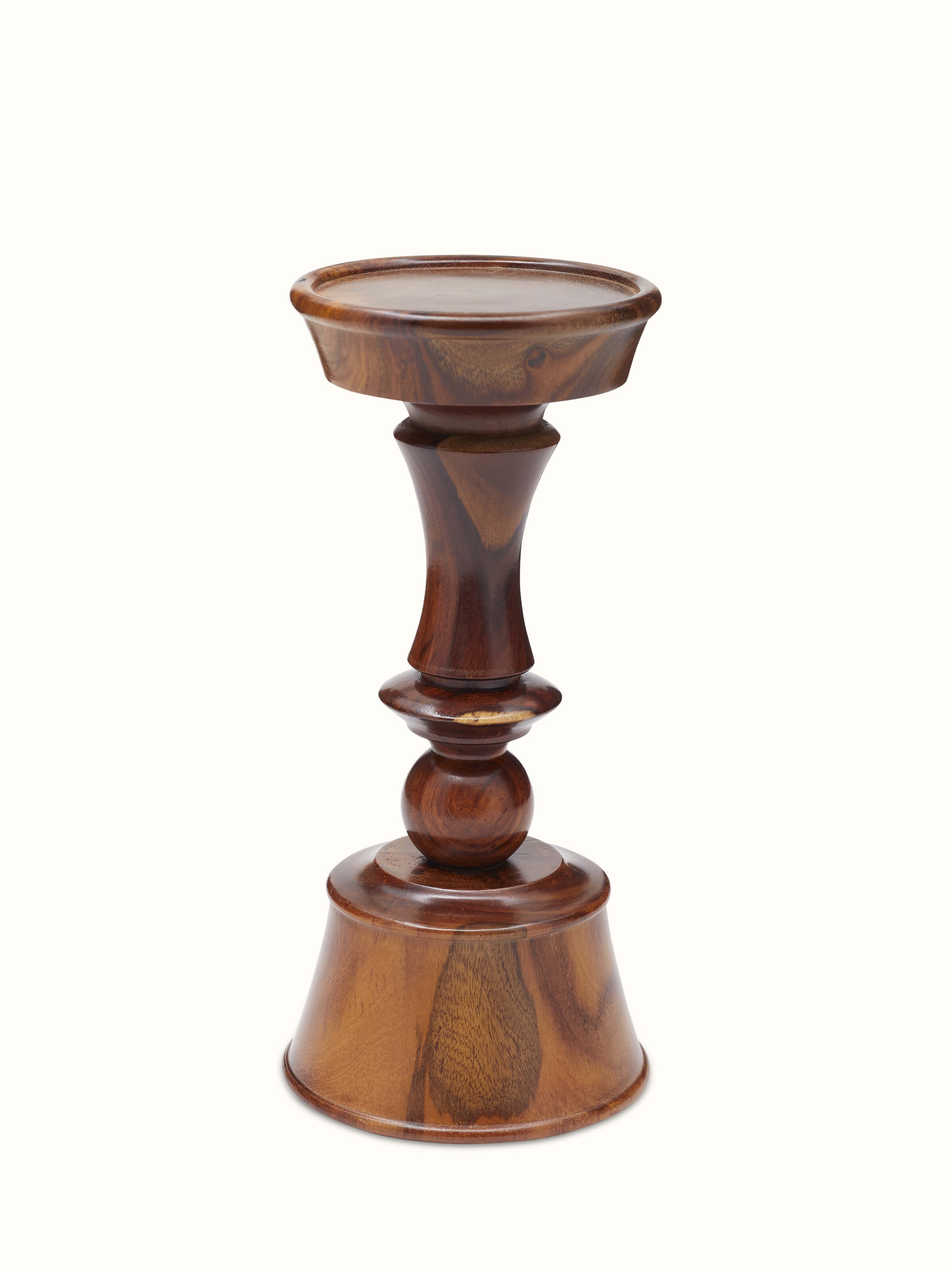 Detailed view of Sheesham wood candle holder highlighting wood grain and craftsmanship