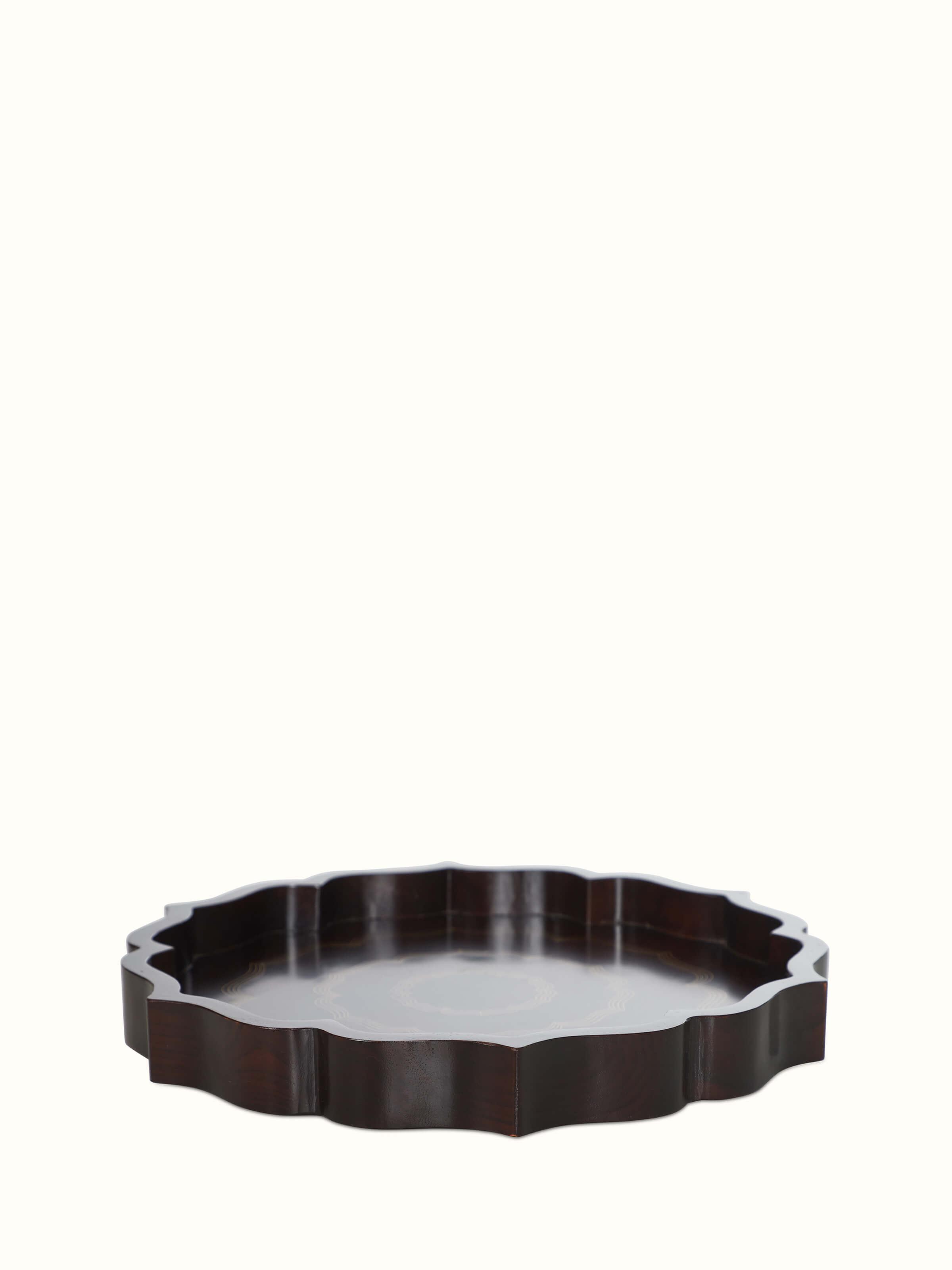 Angle view of Tarkashi Sheesham wood & brass decorative tray in brown color emphasizing its intricate details.