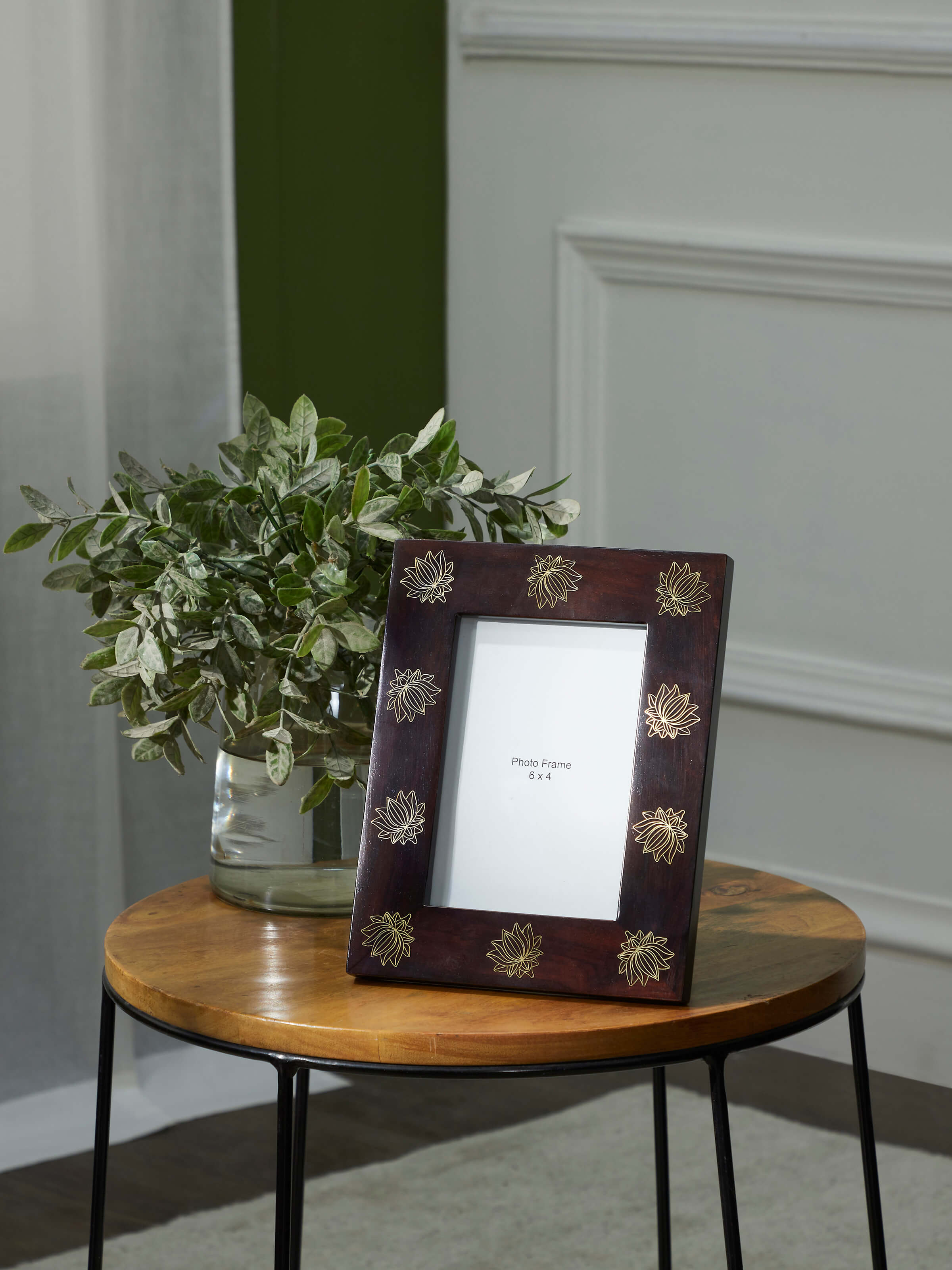 Side view of Tarkashi sheesham wood & brass lotus photo frame highlighting the intricate lotus design and craftsmanship