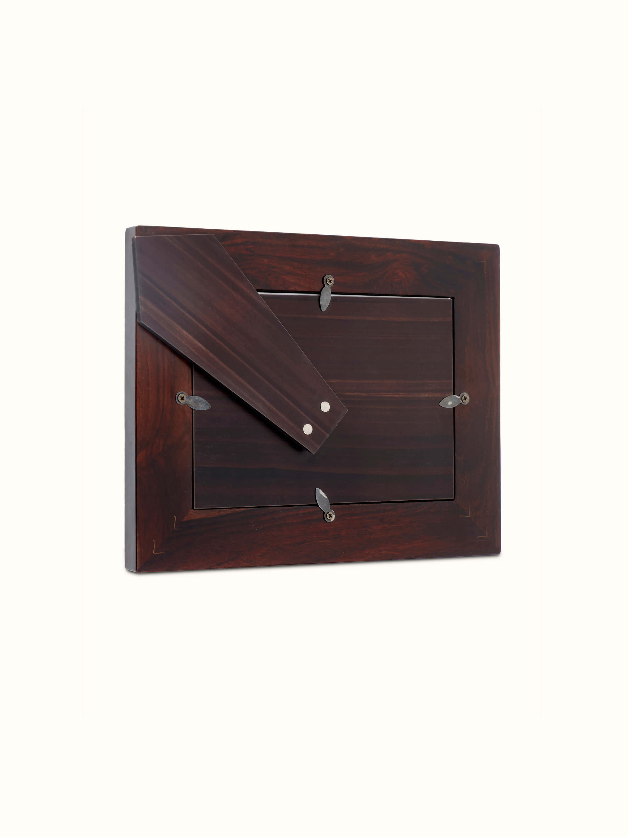 Detailed view of Tarkashi sheesham wood & brass lotus photo frame focusing on the decorative brass elements and smooth wood finish