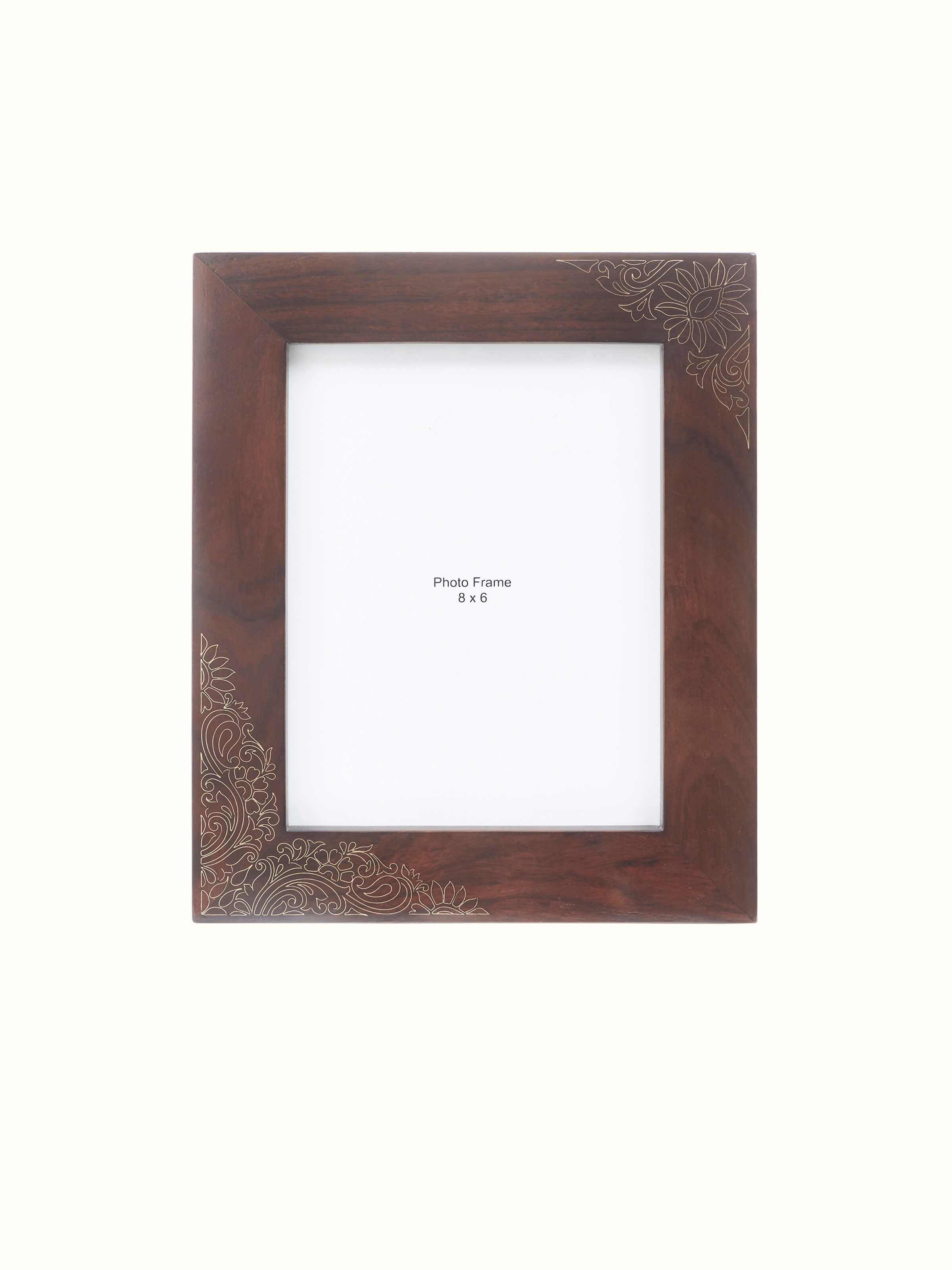 Tarkashi sheesham wood and brass photo frame in brown color with intricate detailing.