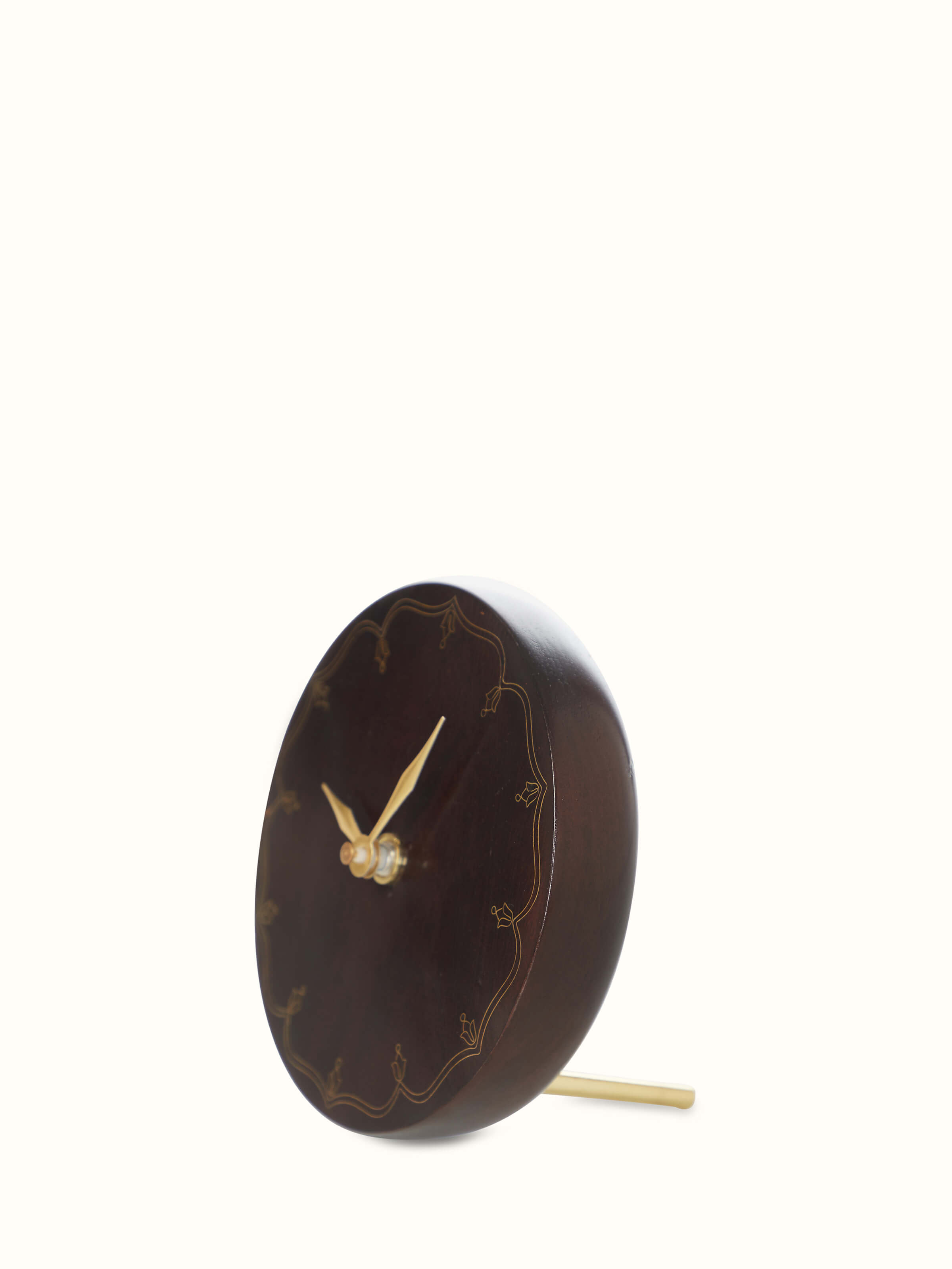 Angled view of natural tarkashi sheesham wood & brass table clock, showcasing its detailed brass inlays and elegant wood finish