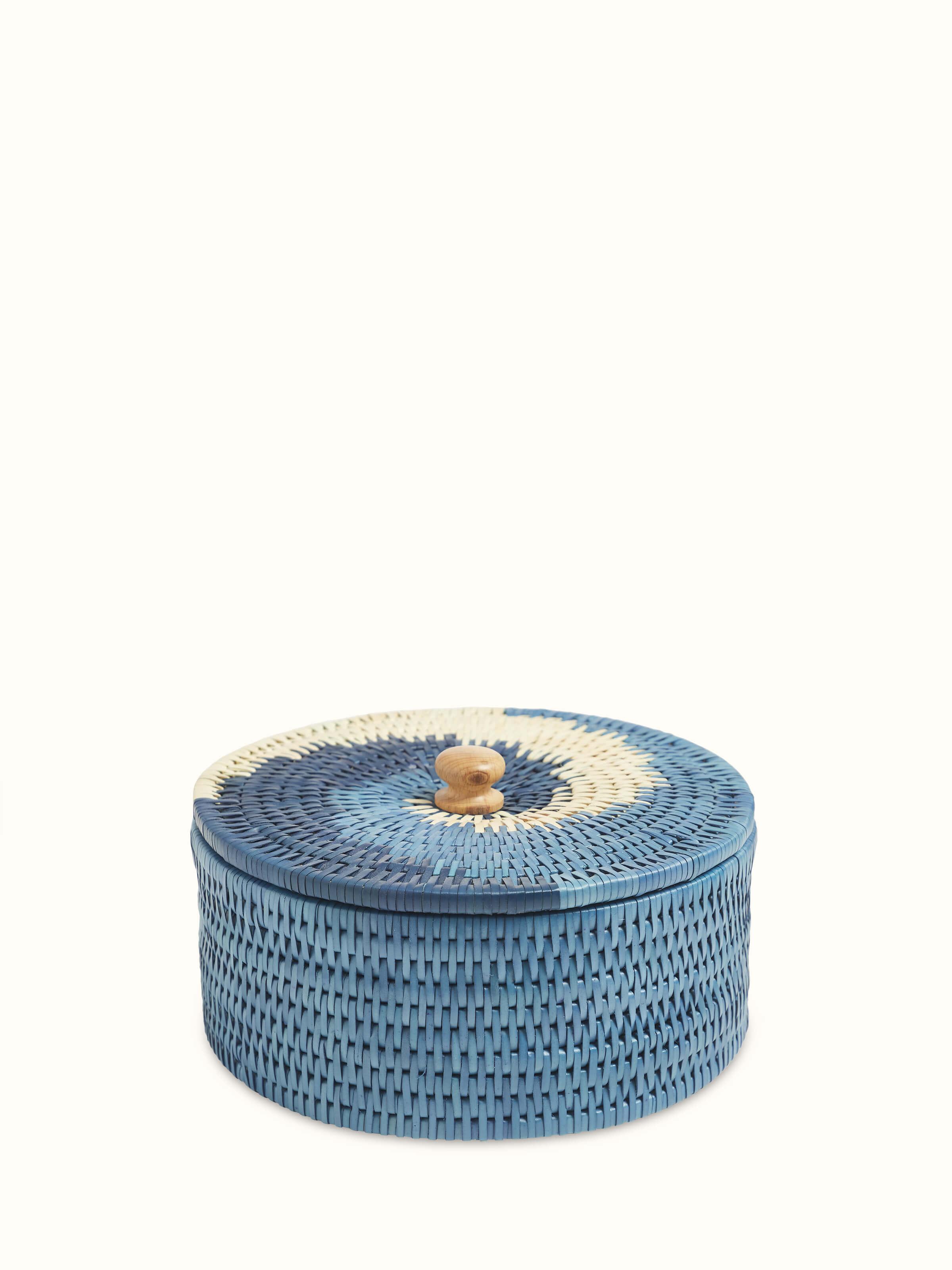 Front view of Palm leaf roti box blue highlighting its traditional design.