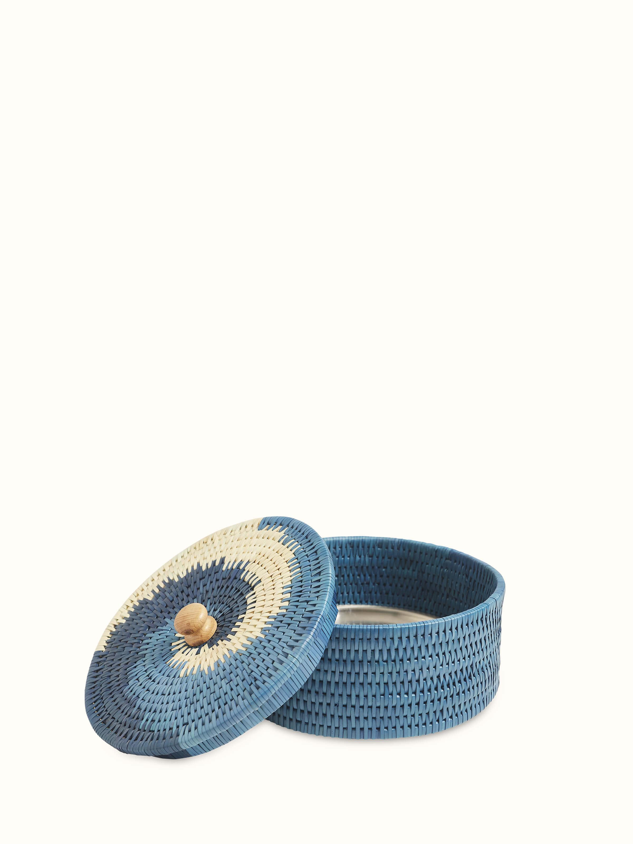 Detailed view of Palm leaf roti box blue highlighting its intricate design.