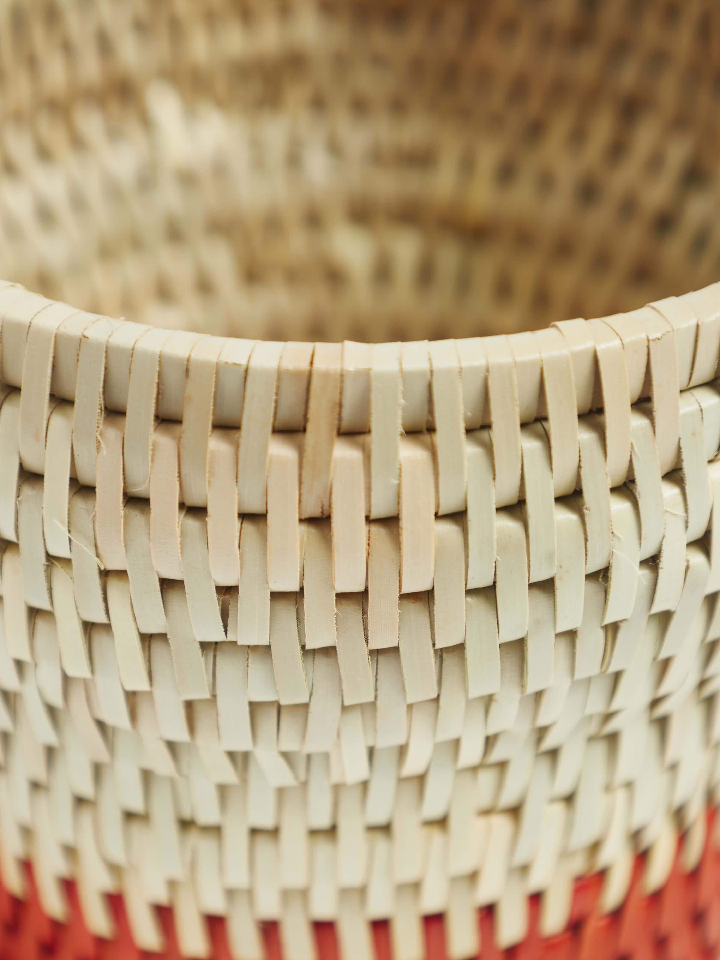 Angled view of Palm Leaf Cutlery Holder displaying its practical design and natural coloring