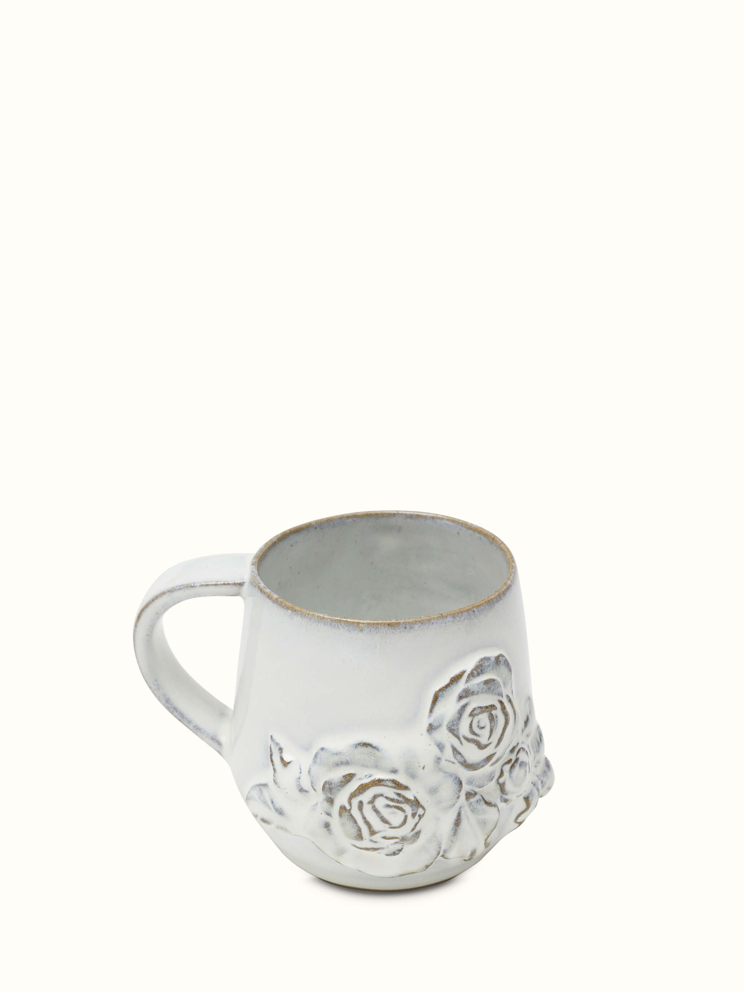 Side view of Studio pottery ceramic coffee mug white showing handle design