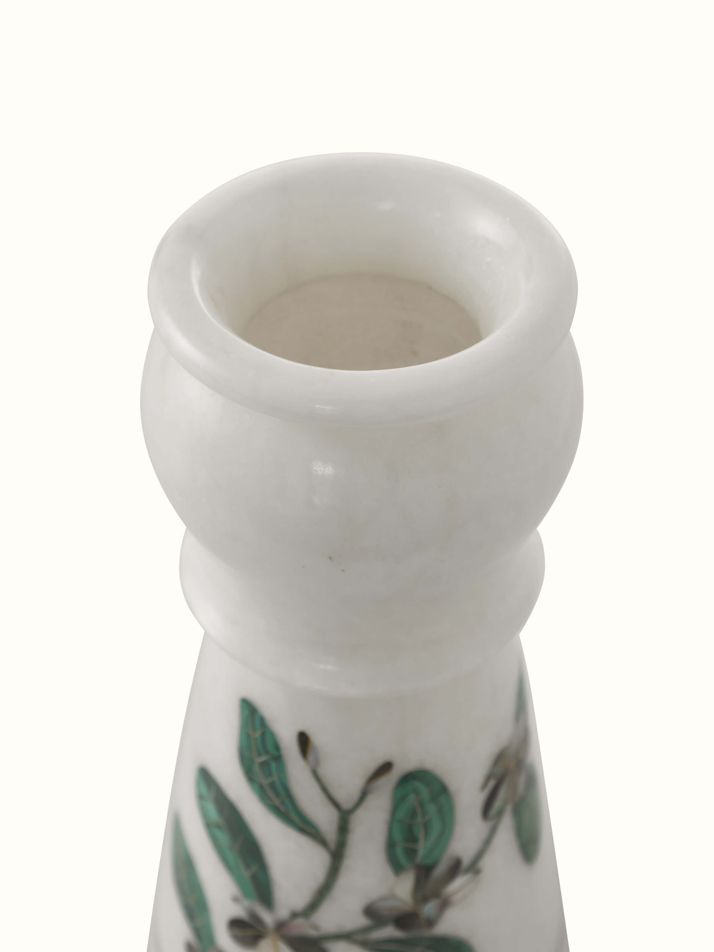 Close-up view of Pacchikari marble leaf floor vase focusing on the fine marble detailing and the leaf motif.