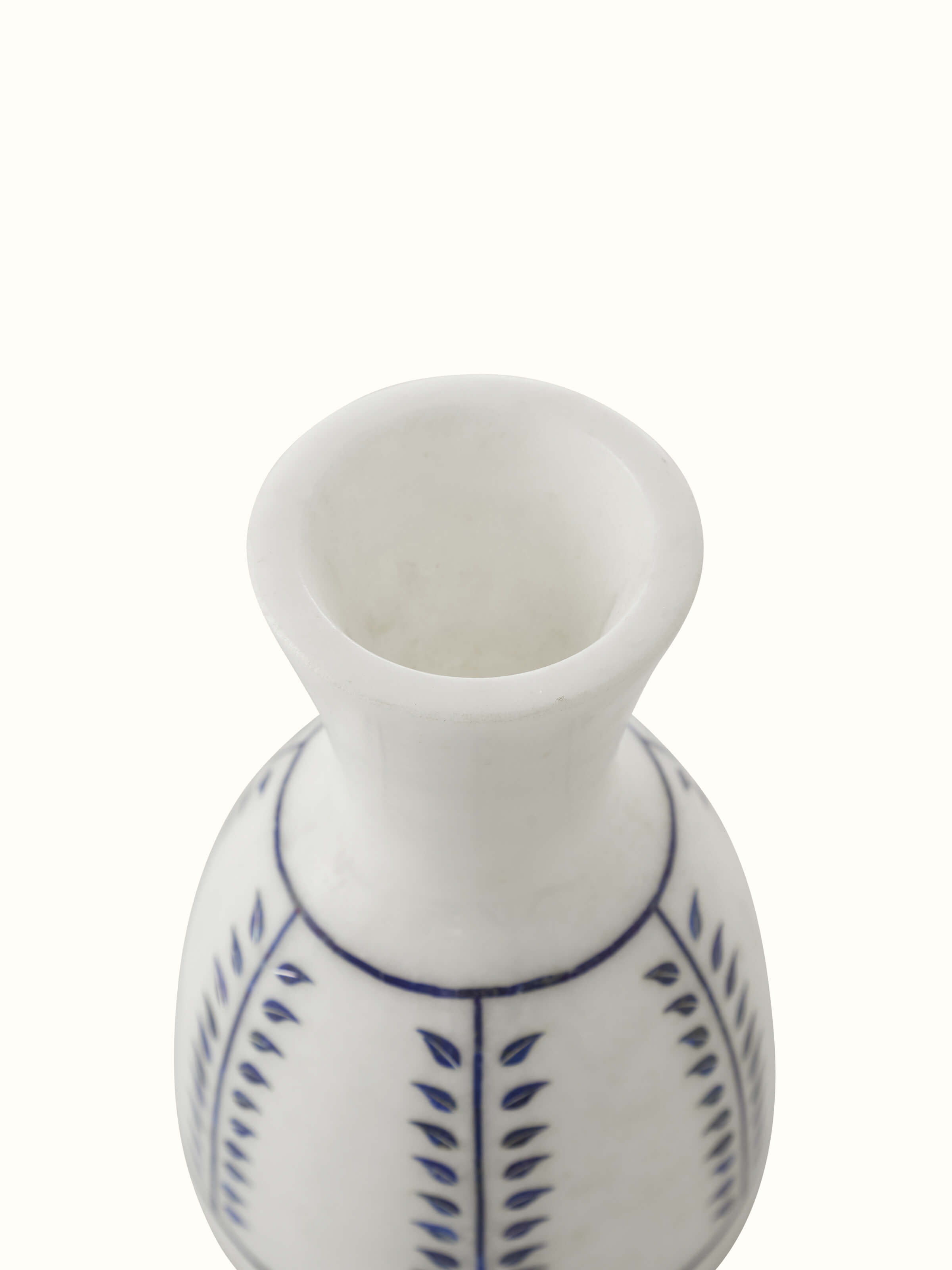 Detailed view of Pacchikari marble floor vase in white color showcasing craftsmanship