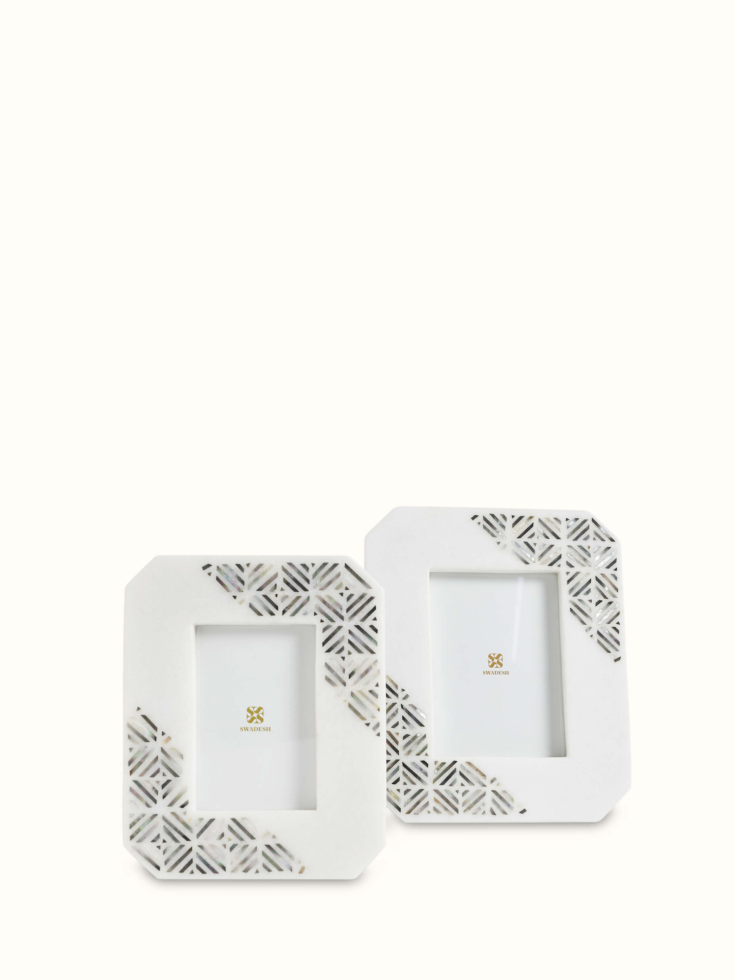 Close-up view of Pacchikari marble photo frames in white color emphasizing marble texture and finish