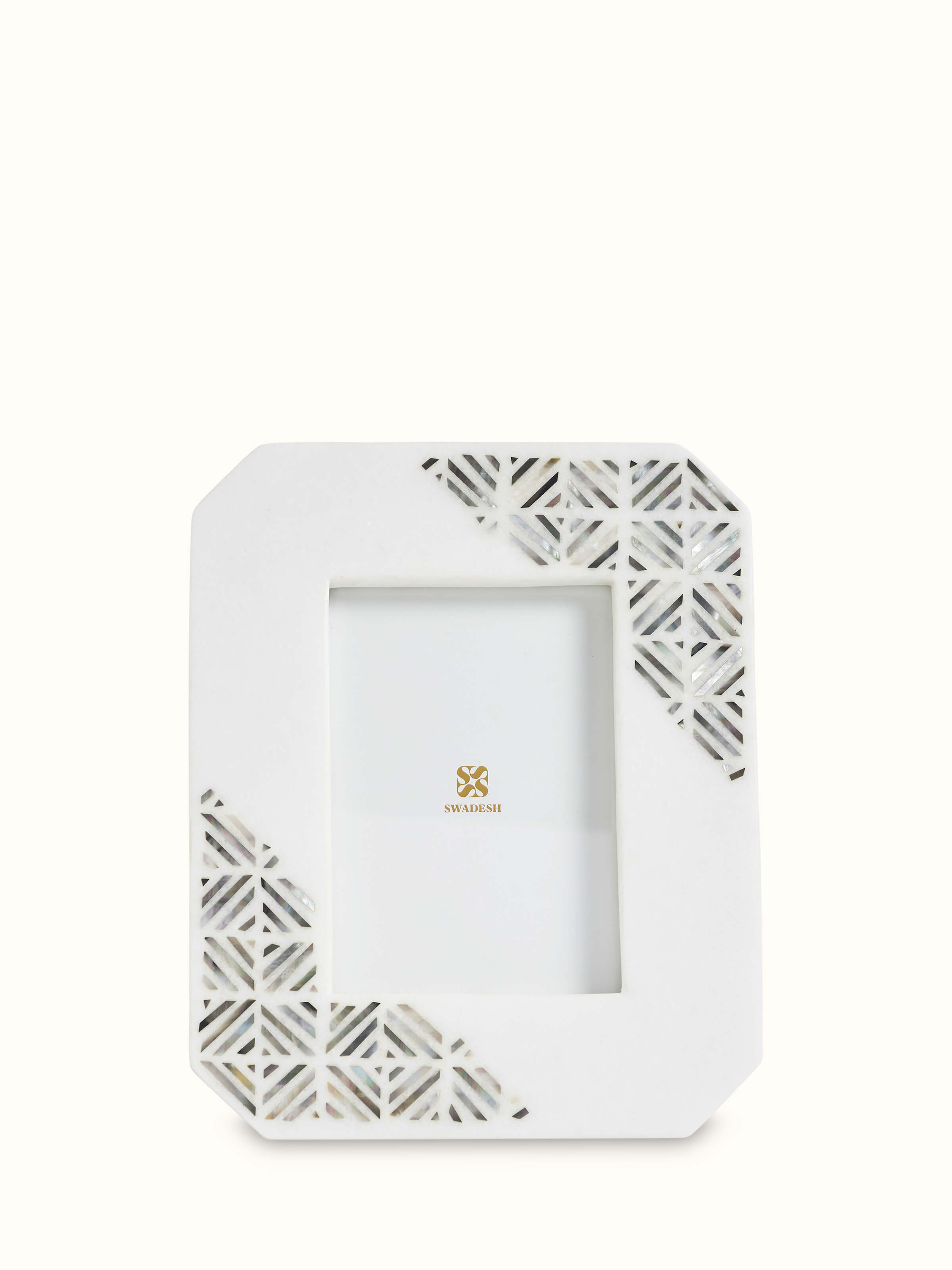 Angled view of Pacchikari marble photo frames in white color showcasing elegant design details