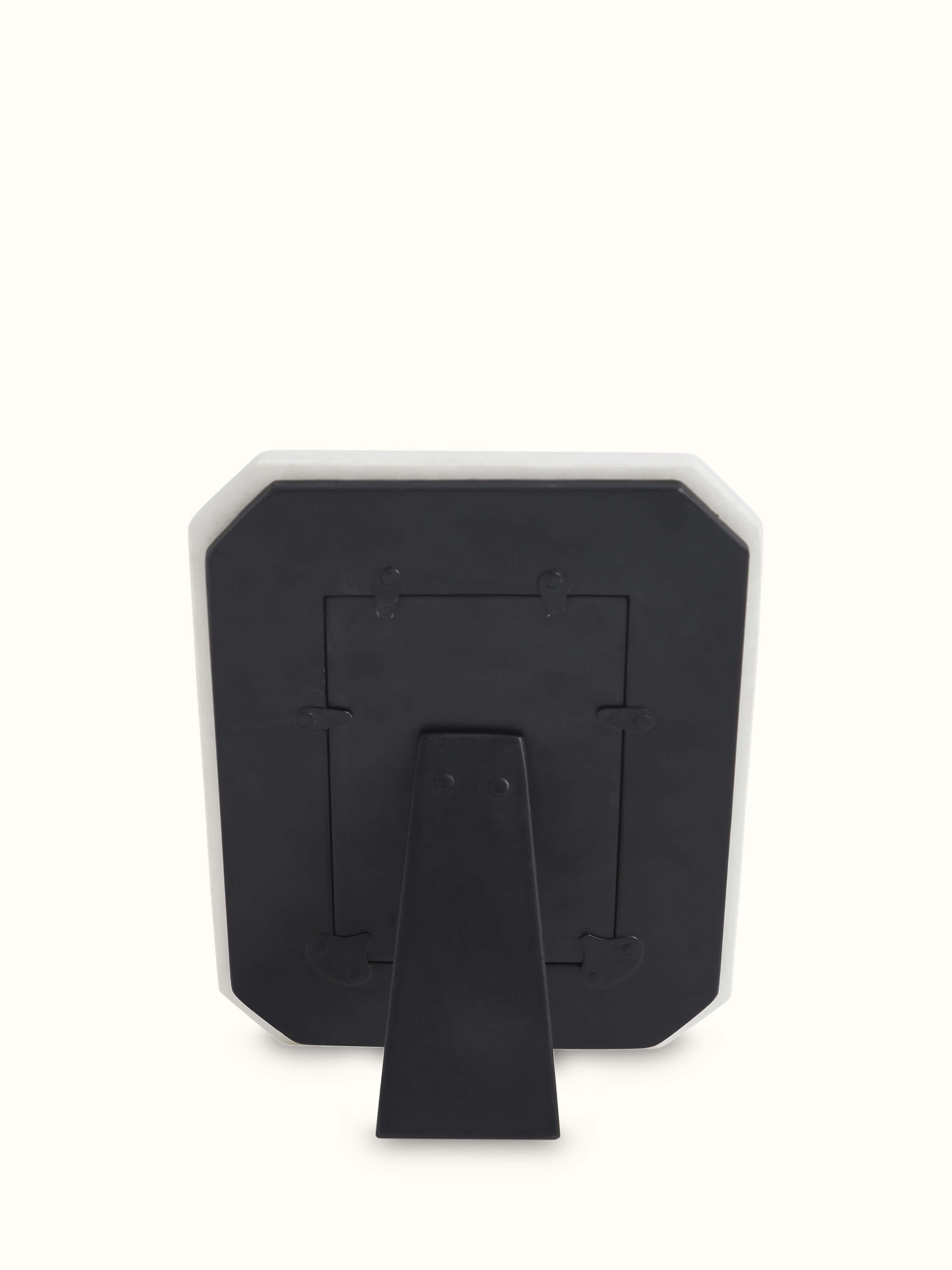 Close-up of Pacchikari marble photo frames in white color showcasing refined marble craftsmanship