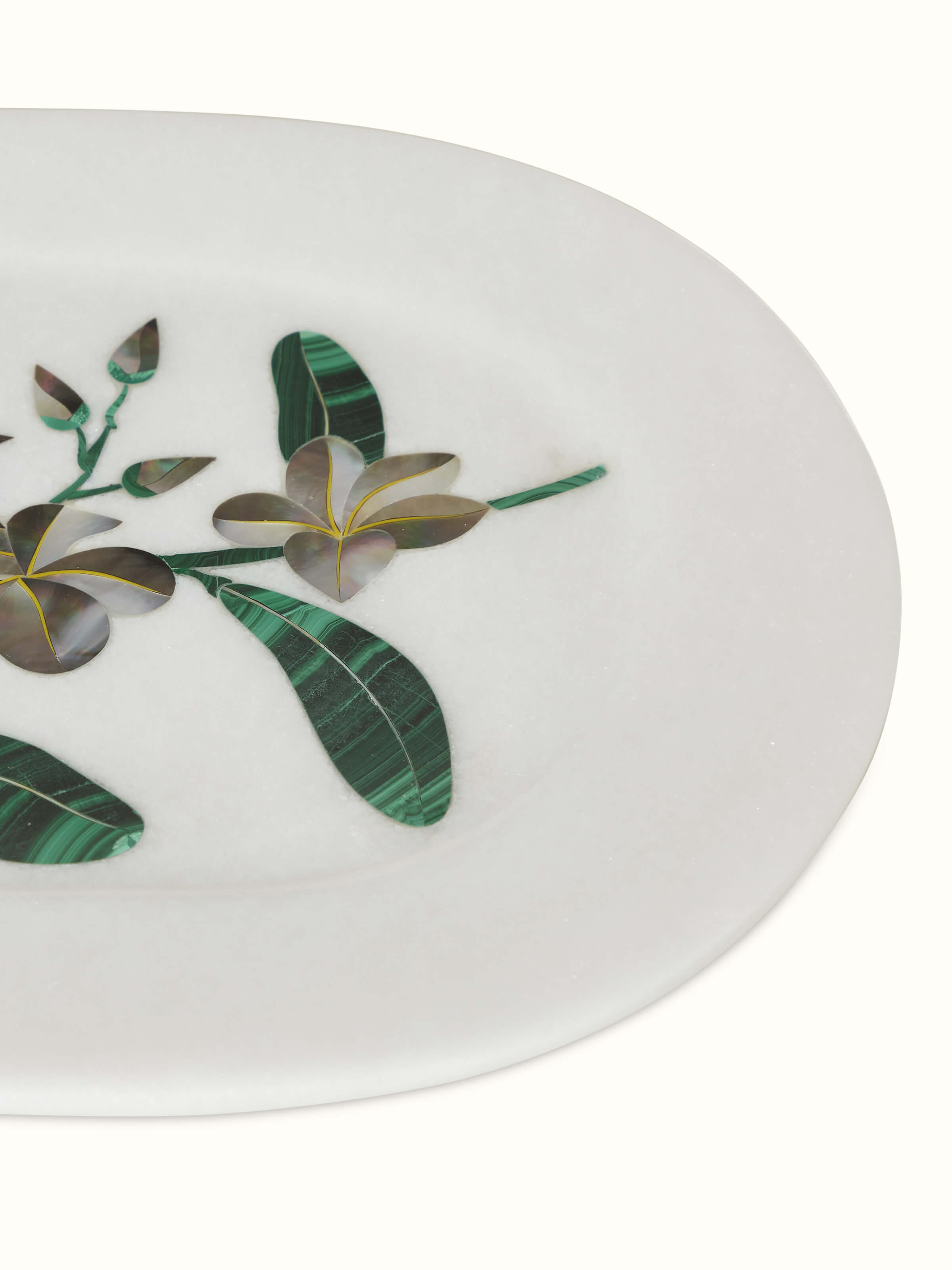 Artistic view of white pacchikari marble tray, highlighting the overall marble design.