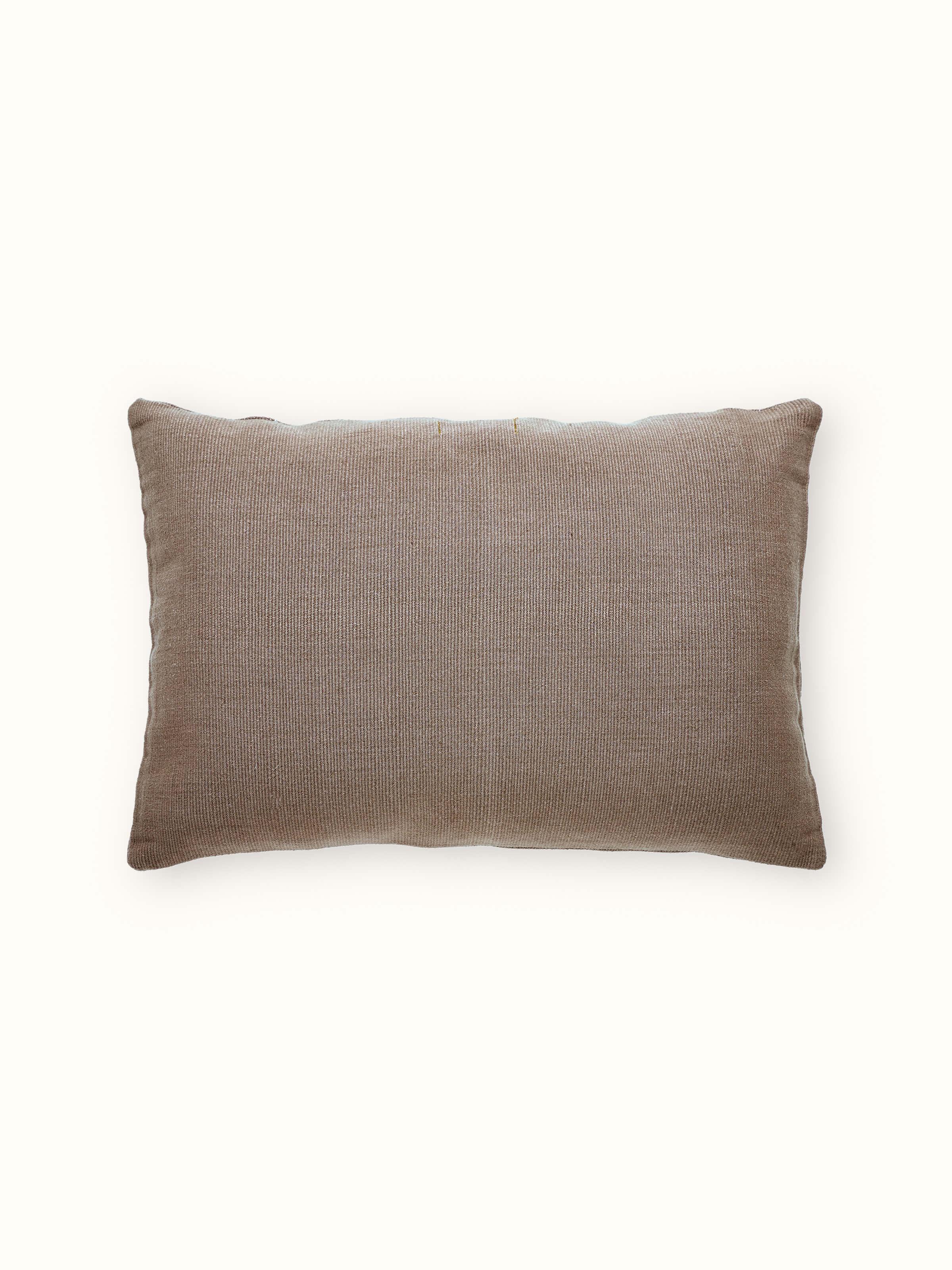 Close-up view of Ridhama khakhi jani cotton Naga handloom cushion cover showing the fabric’s handloom details and khakhi shade.