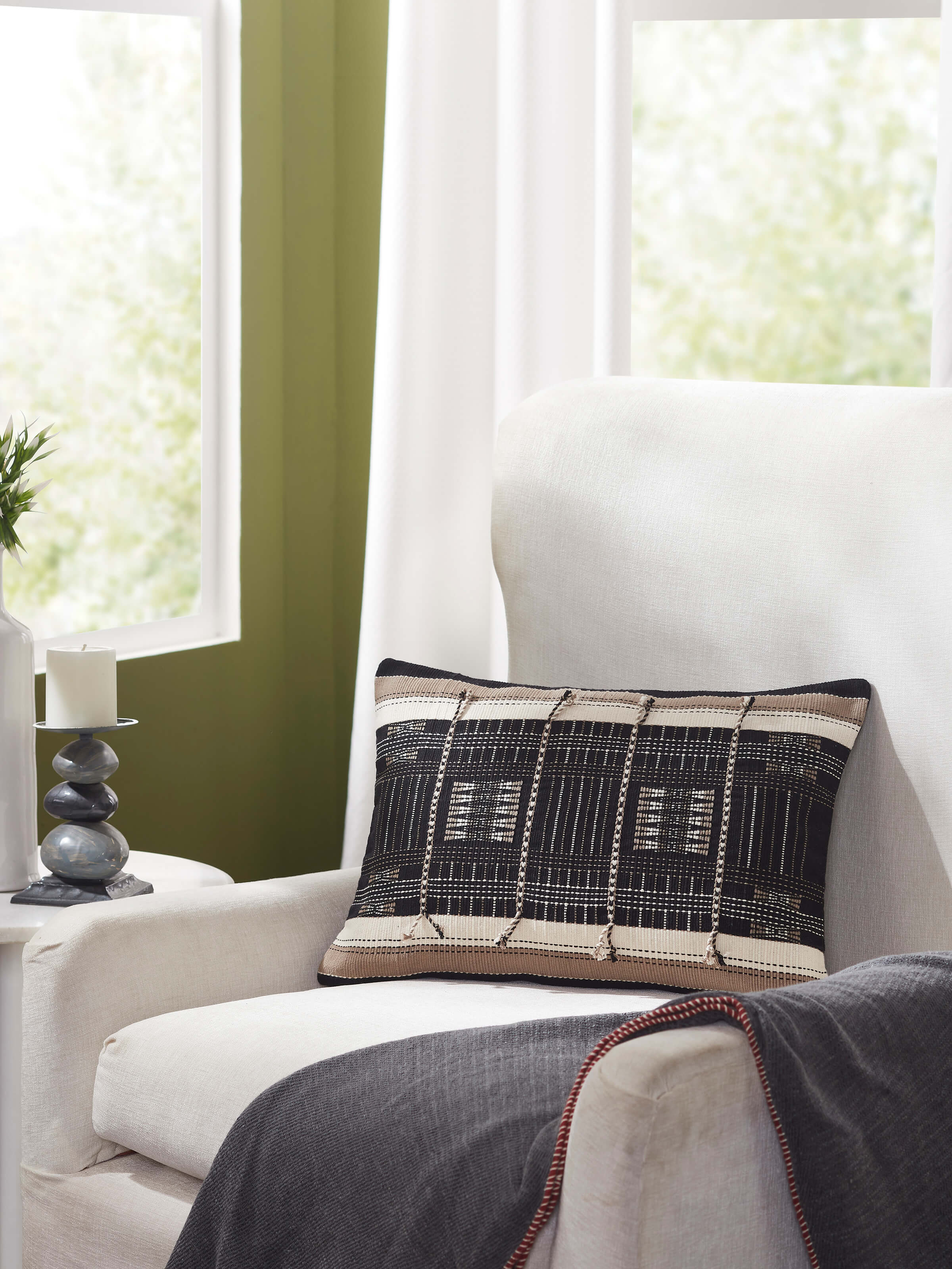 Close-up of Ridhama Black Mrunal Cotton Naga Handloom Cushion Cover, showcasing the handloom texture and detailed design.