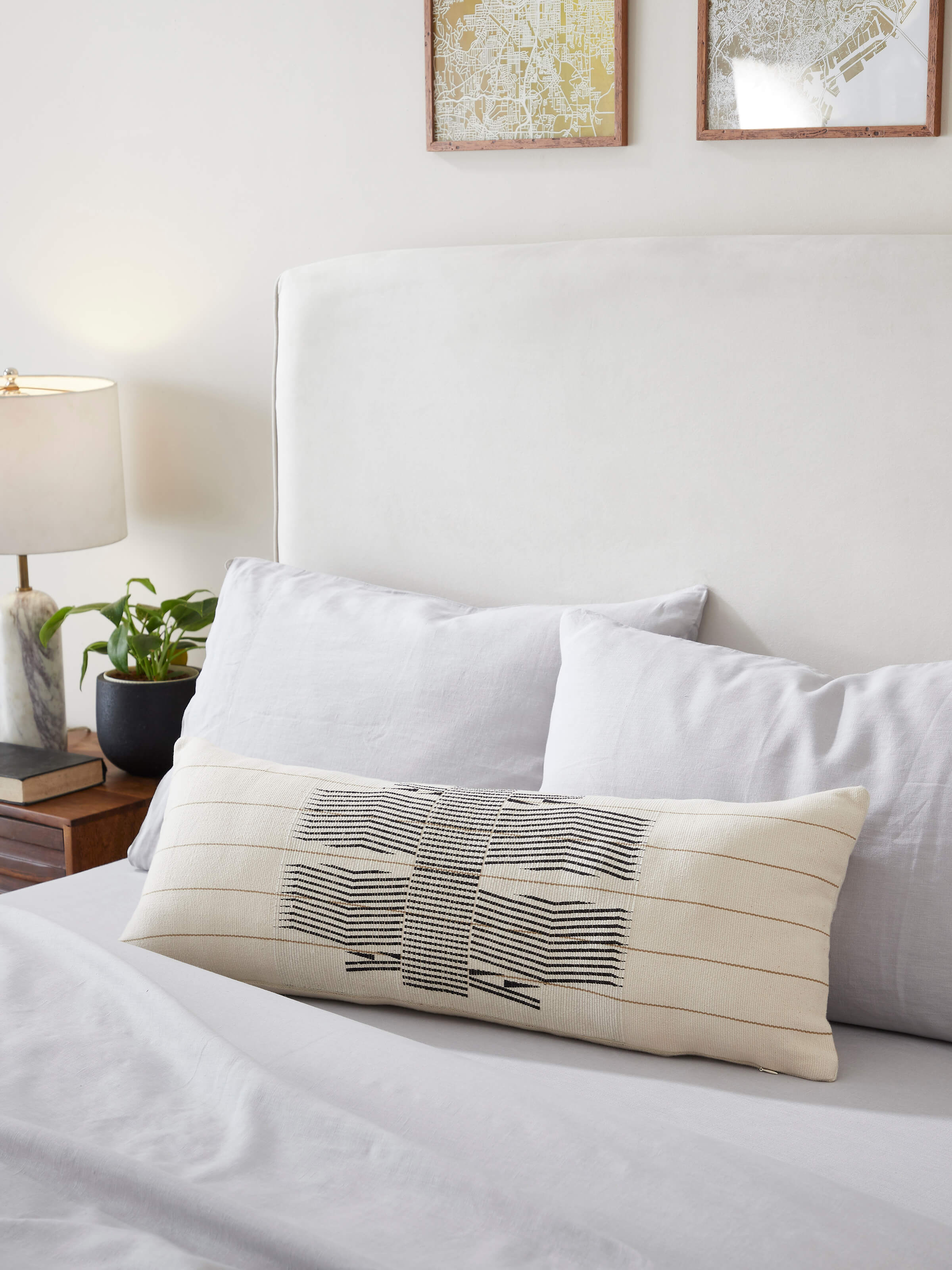 Close-up of Ridhama white Kalinda cotton Naga handloom cushion cover highlighting the intricate handloom details.