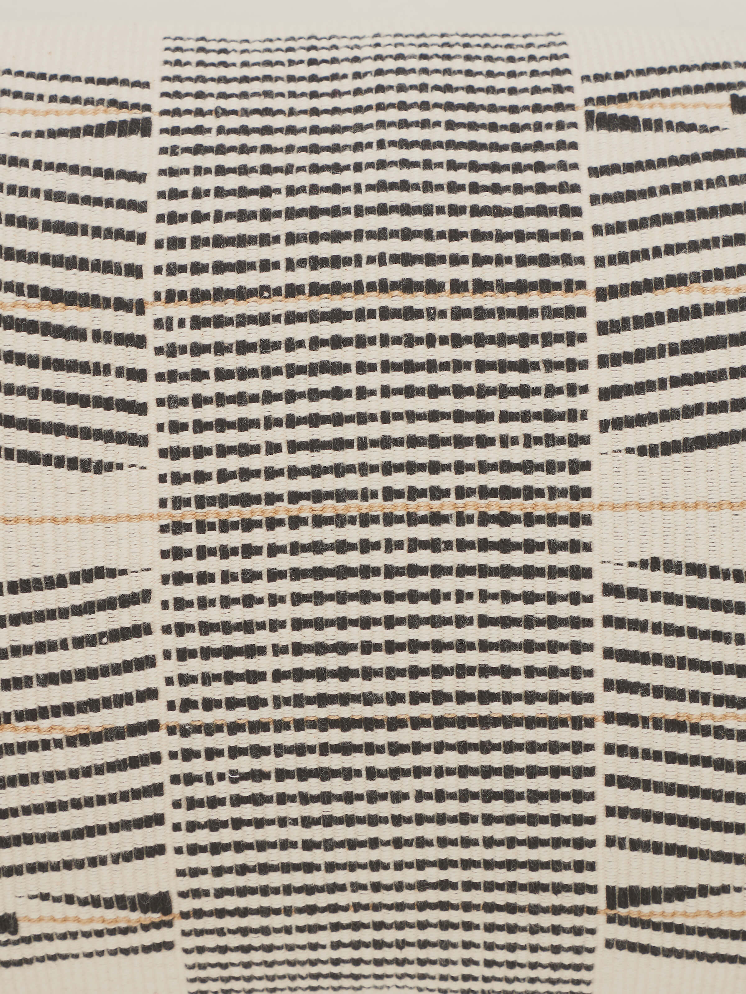 Ridhama white Kalinda cotton Naga handloom cushion cover in a setting, emphasizing its style and design.