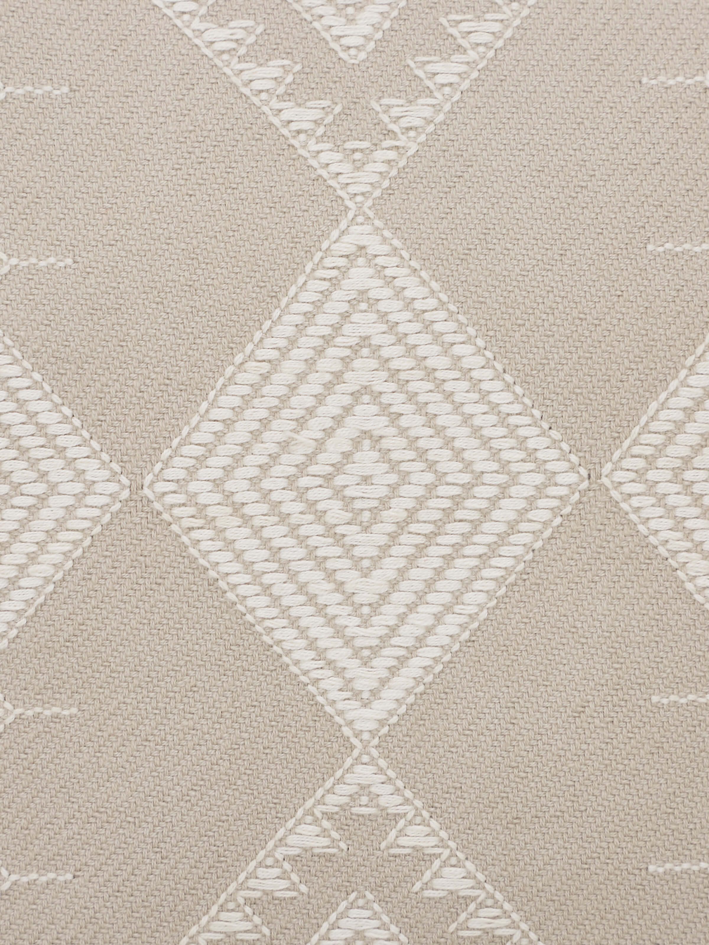 Detailed view of Godna light beige buta cotton handwoven pattu cushion cover, highlighting the handwoven craft and subtle beige design.