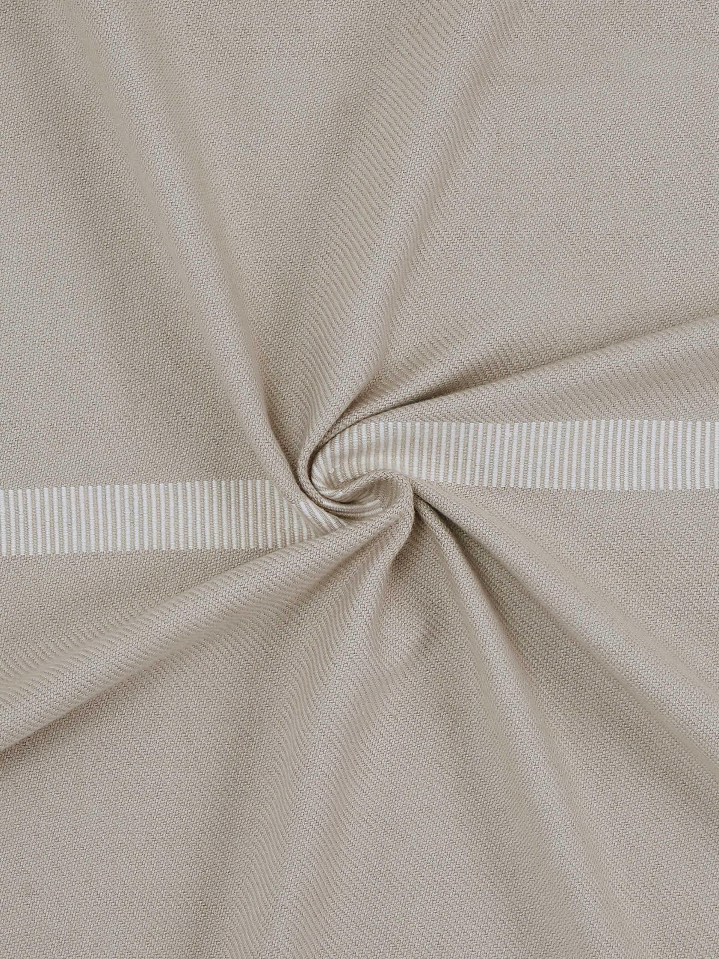 Angled view highlighting the soft cotton weave and traditional handloom pattern.