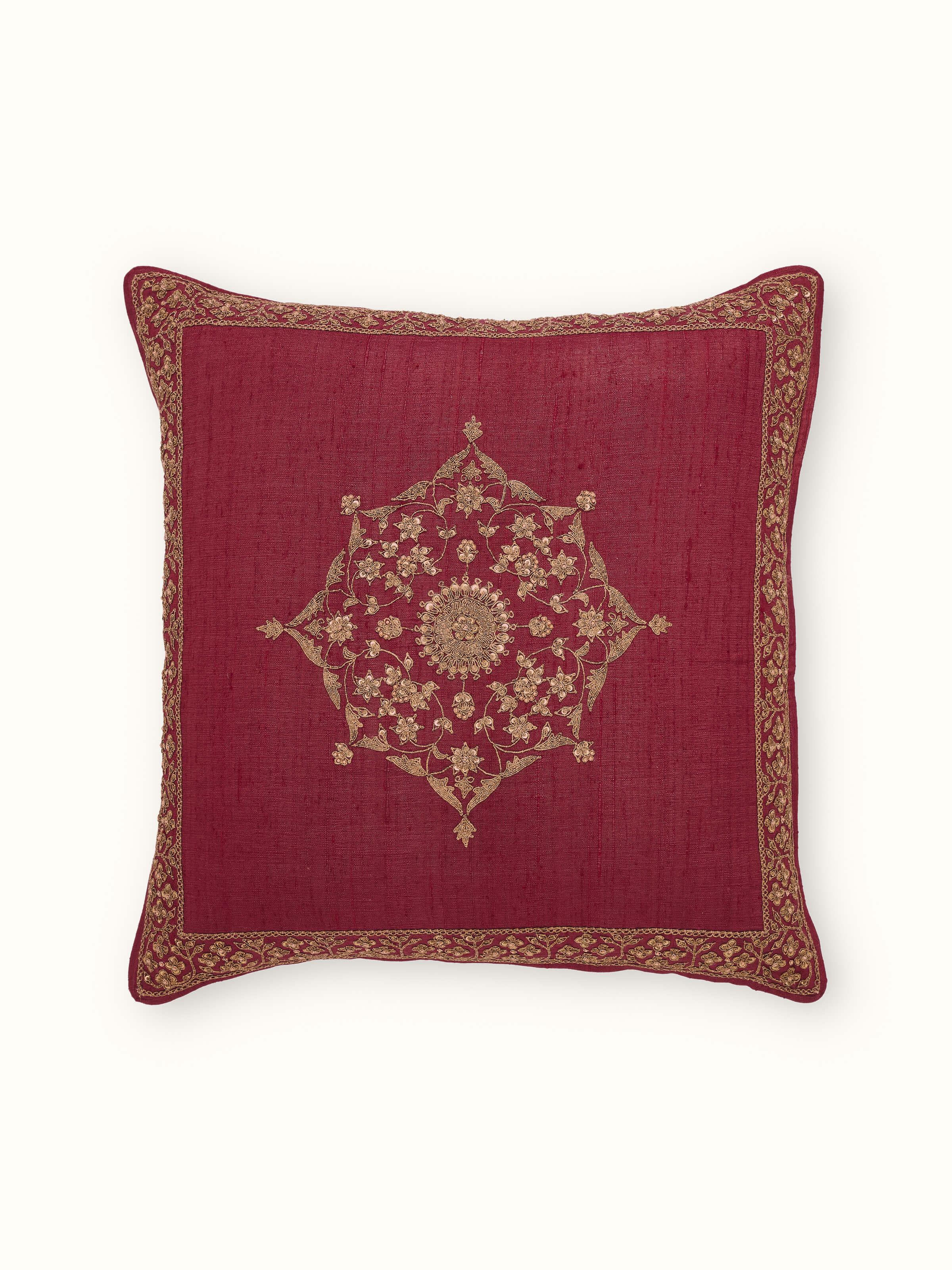 Front view of Alankar maroon buta silk cushion cover featuring zardozi embroidery