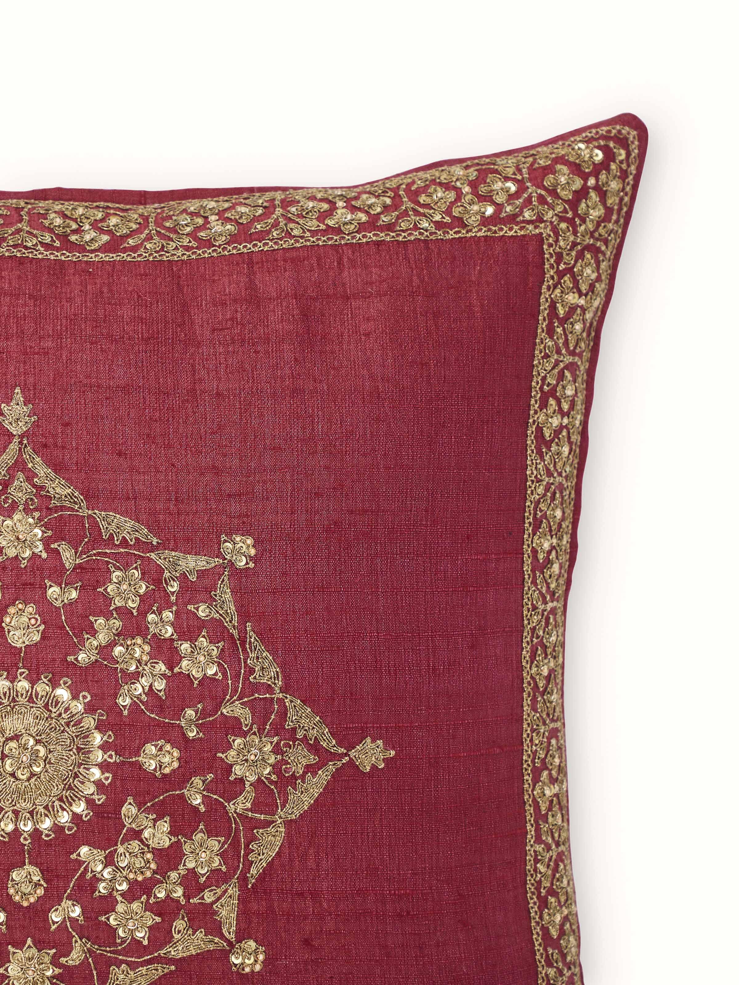 Detailed view of Alankar maroon buta silk cushion cover showing intricate zardozi embroidery