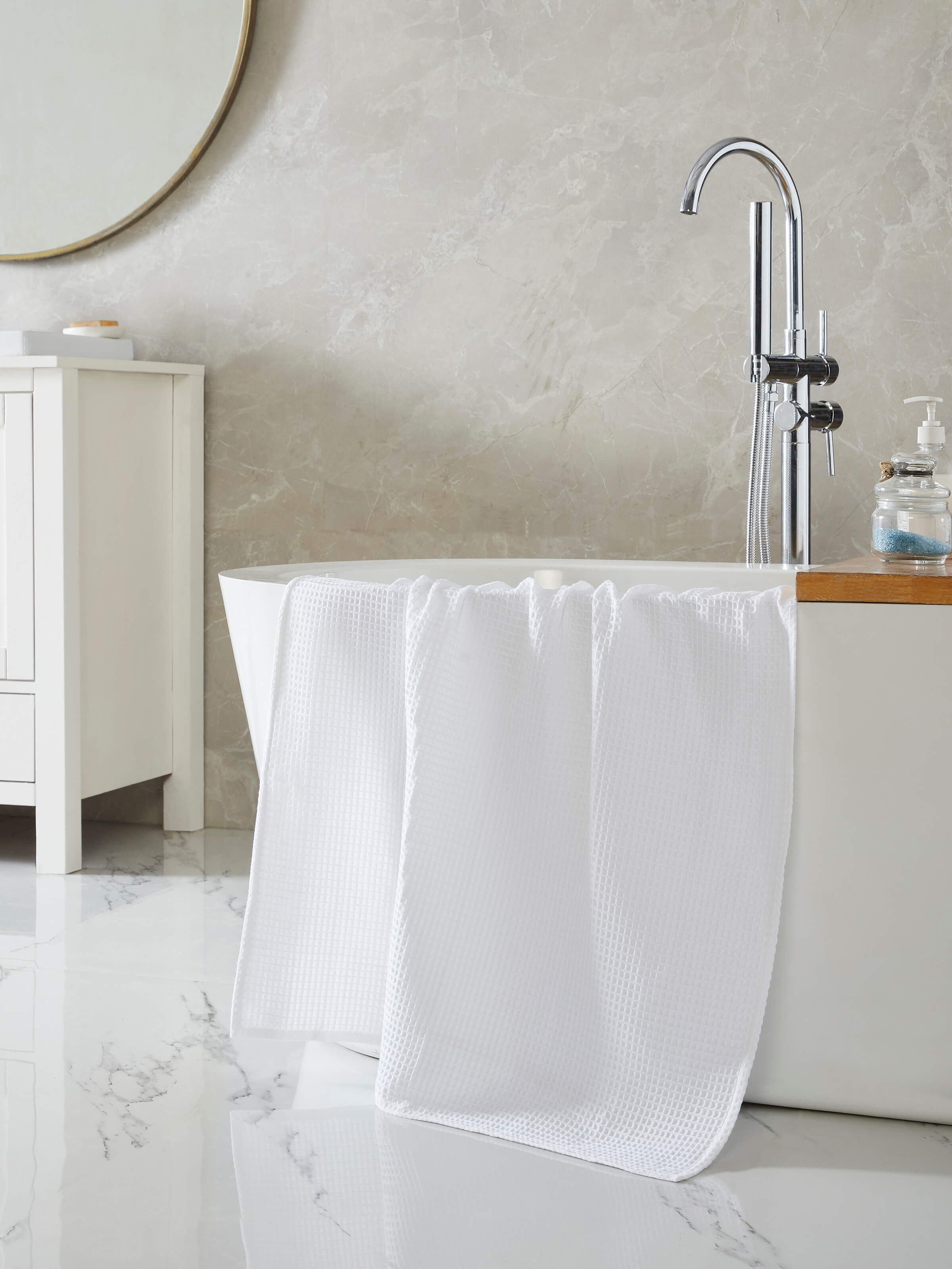 Close-up of Amala waffle white solid cotton bath towel (M), highlighting the waffle weave pattern and cotton fabric quality