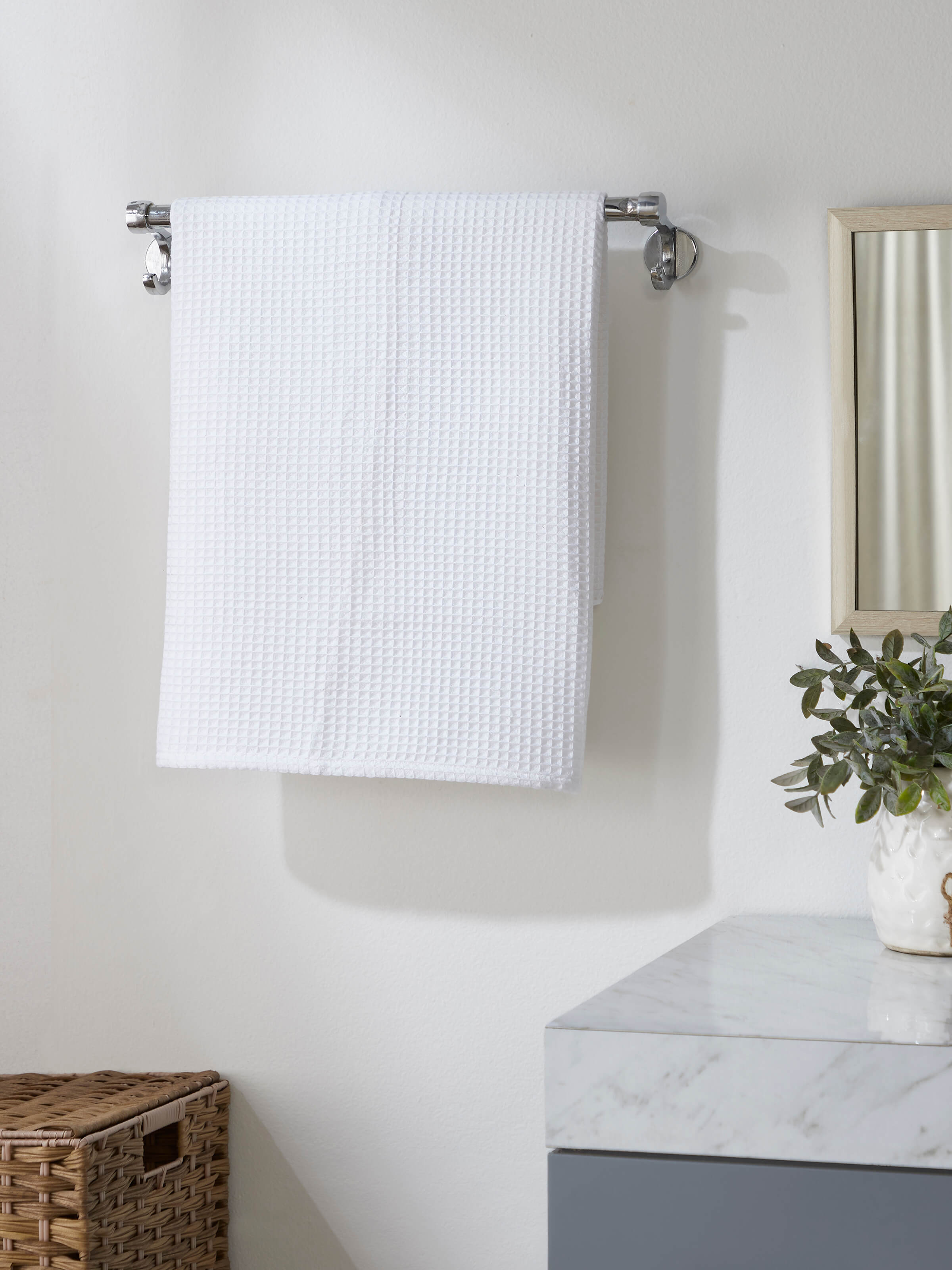Close-up of Amala waffle white solid cotton bath towel highlighting its waffle pattern