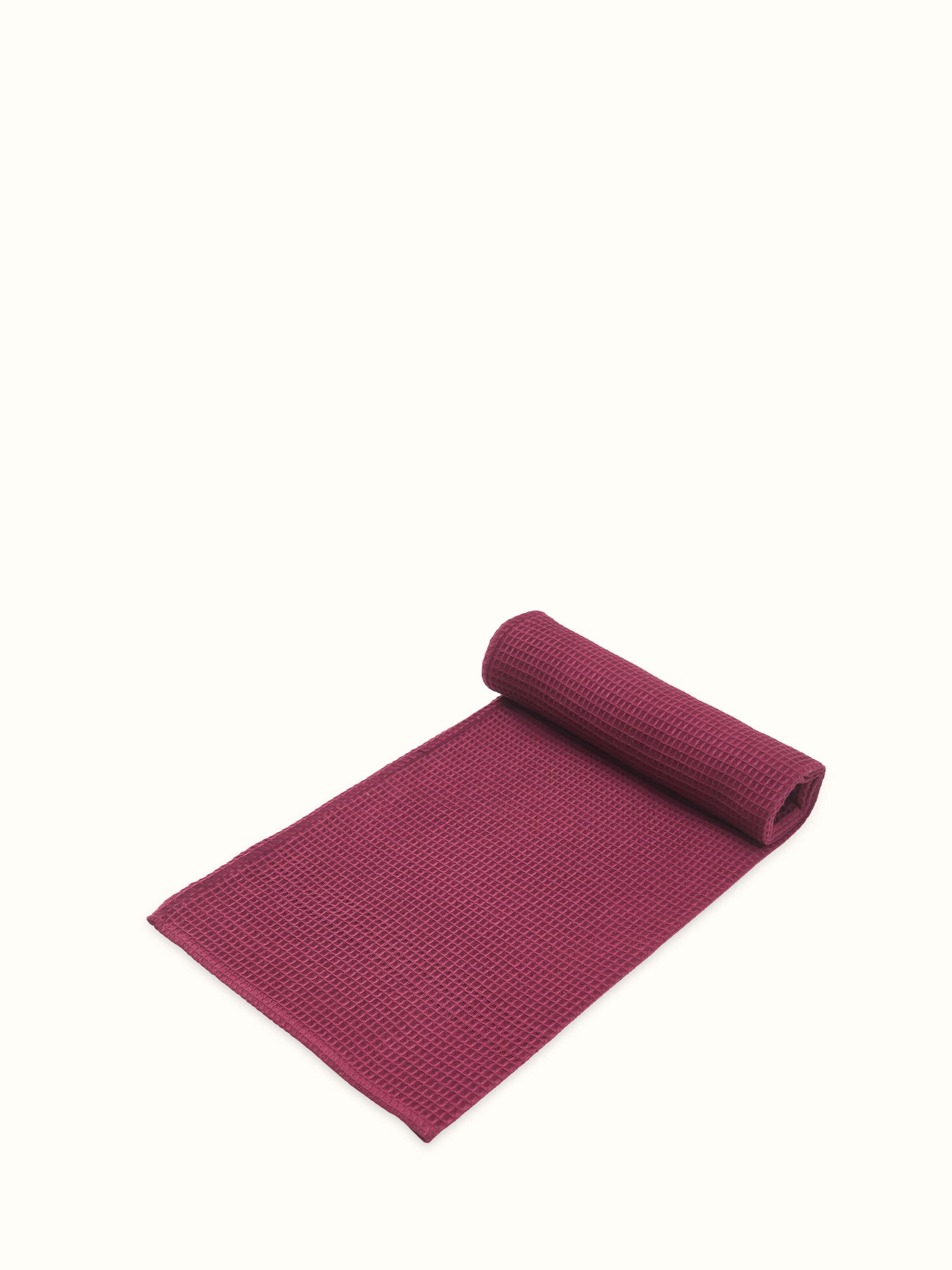 Detailed view of Amala Waffle Purple Solid Cotton Bath Towel (M), showcasing the texture and fabric quality.