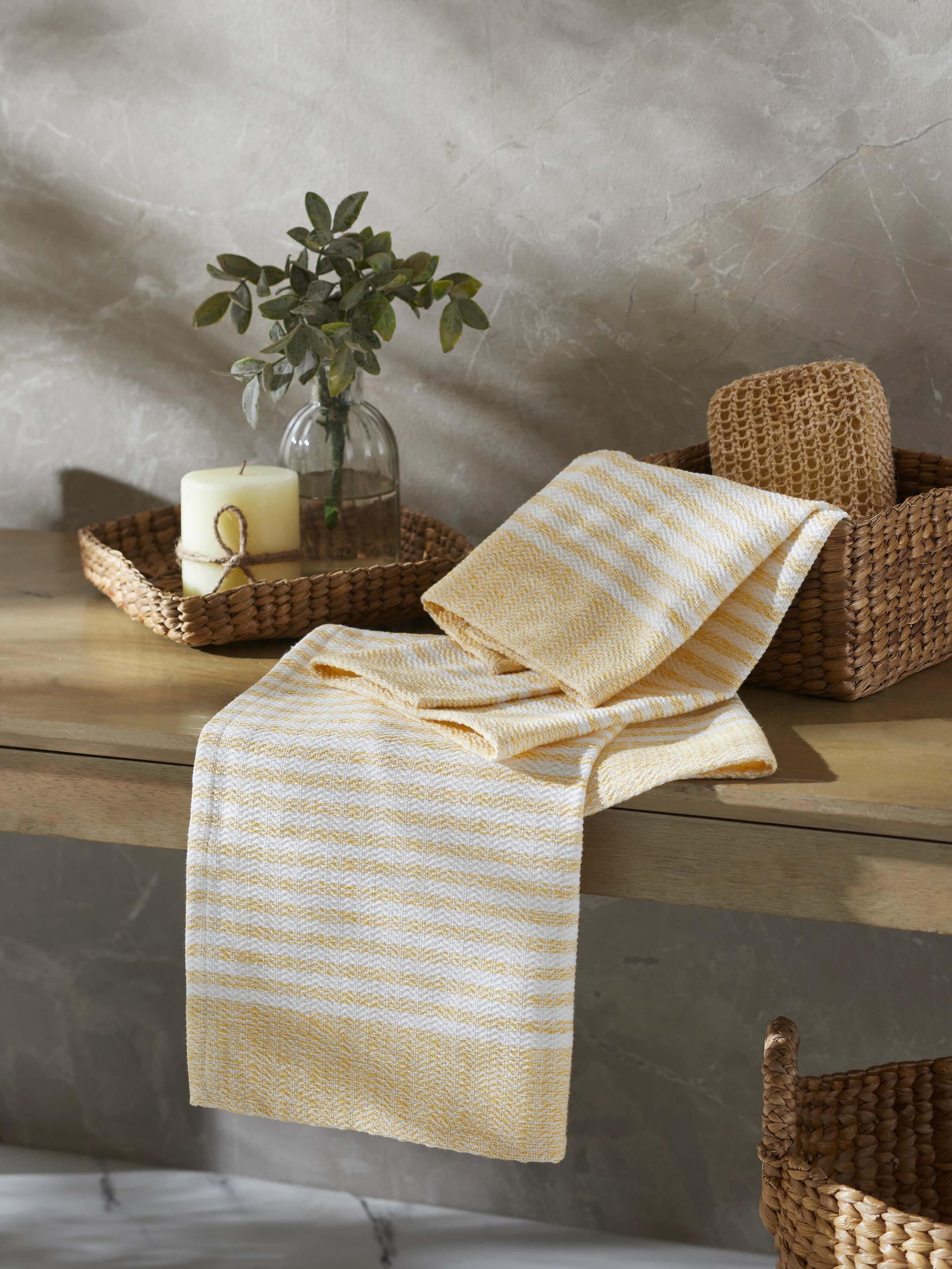 Close-up of Vayana Stripe Yellow Cotton Hand Towels (2 pcs), focusing on the detailed stripe pattern and fabric.