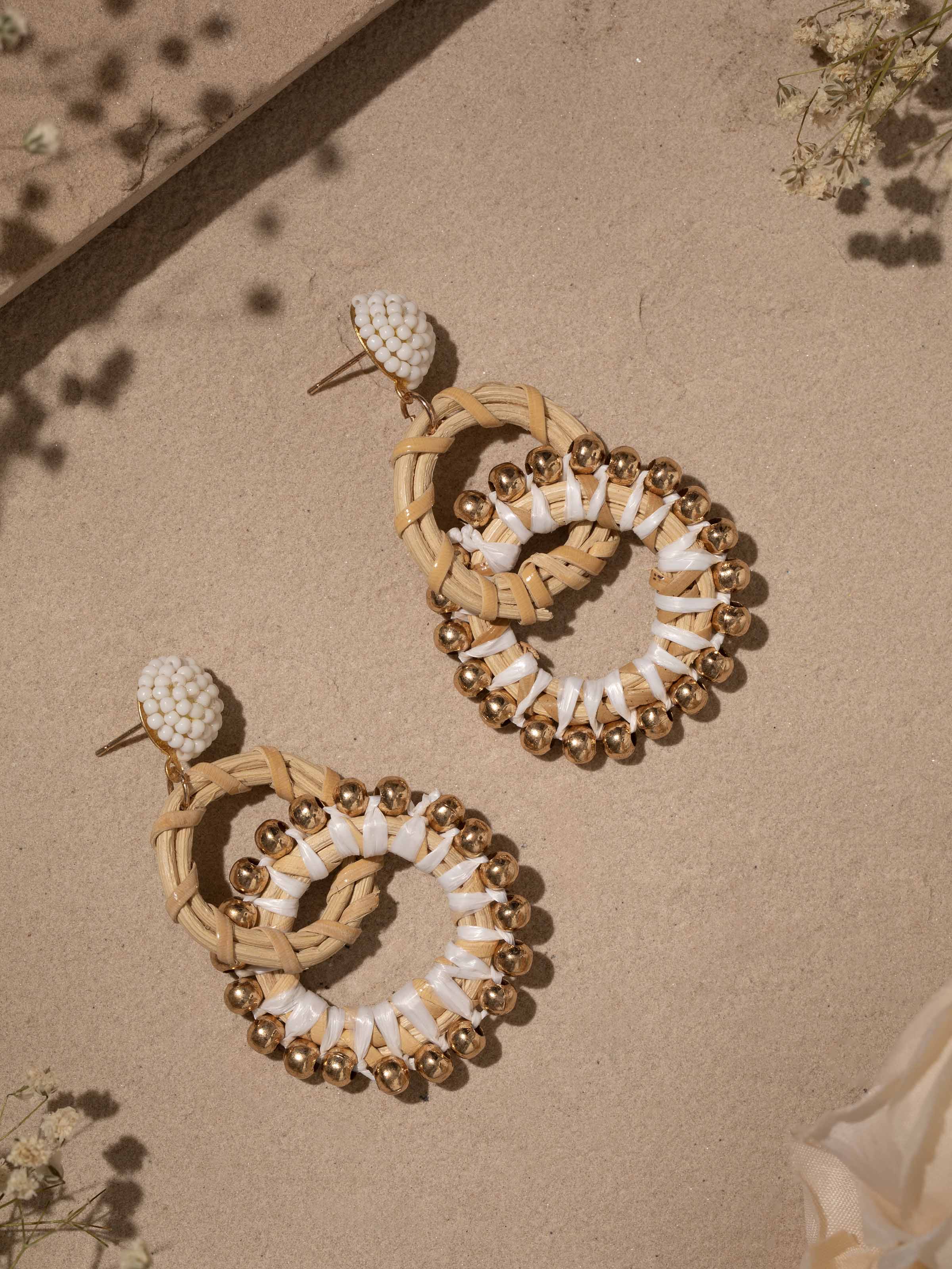 Side view of Handcrafted Drop Earrings showcasing the drop design and artisanal detailing.