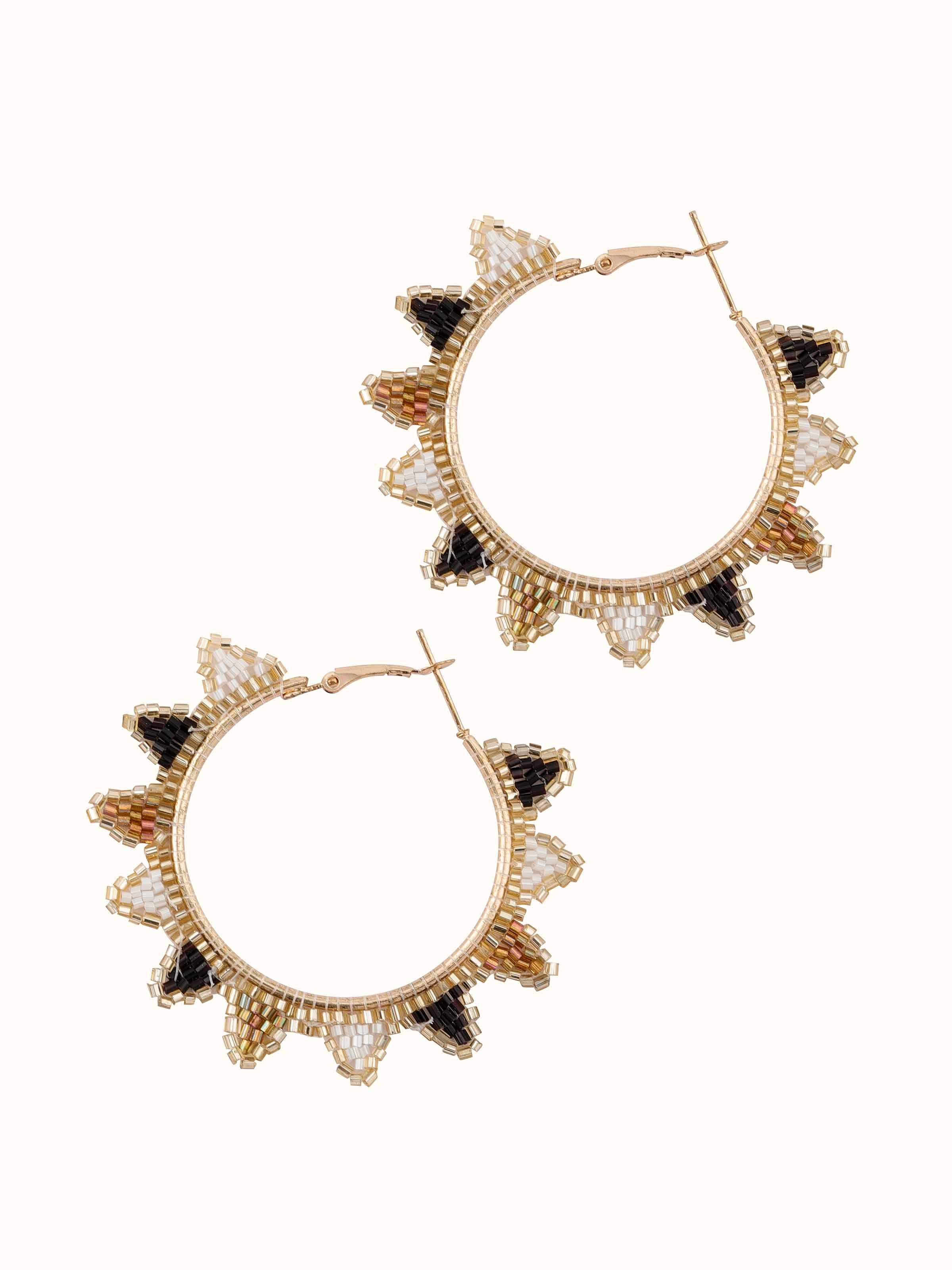 Angled view of Handcrafted Hoop Earrings emphasizing their stylish look.